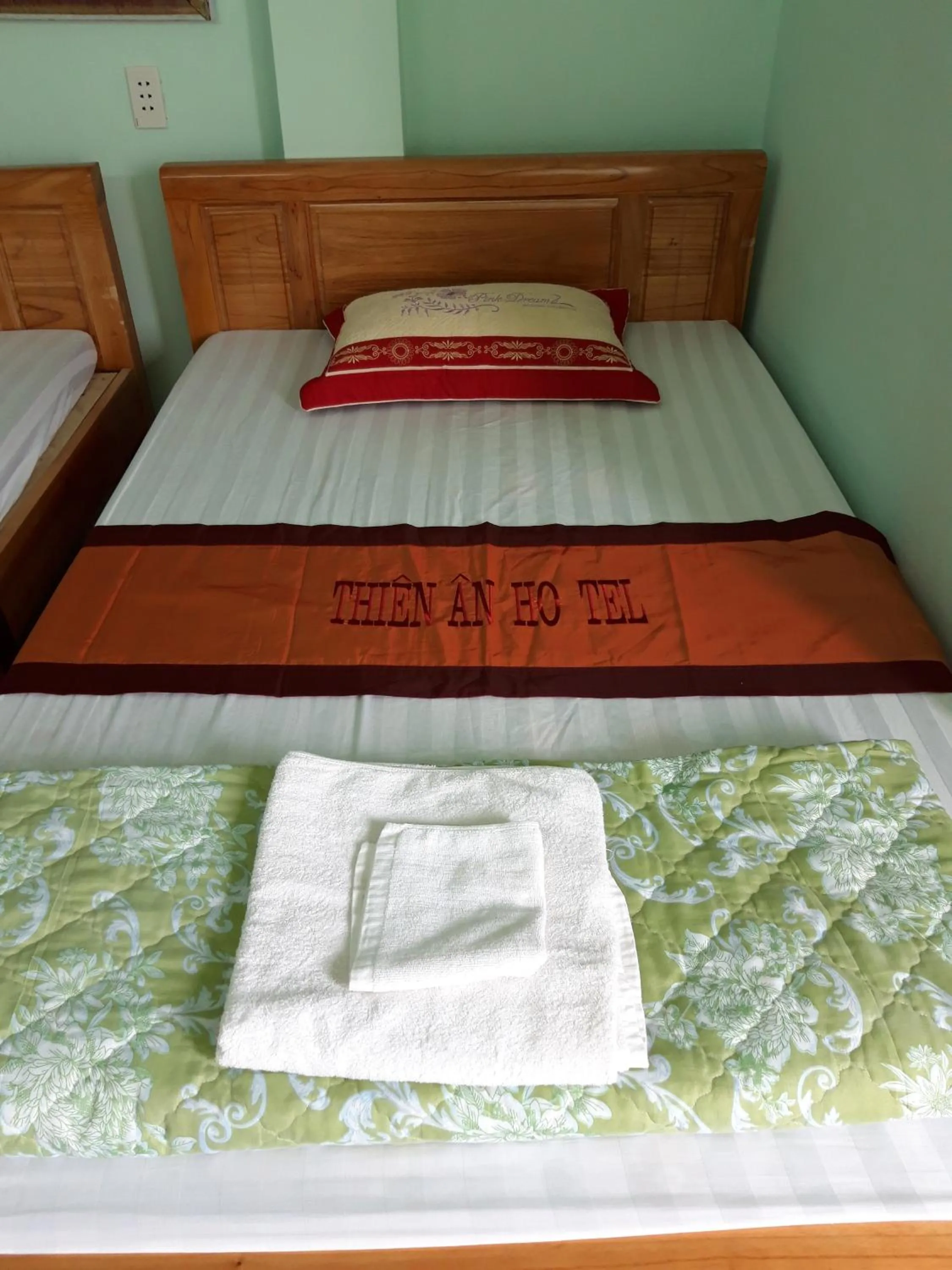 Bed in Yen Minh Hotel Thien An