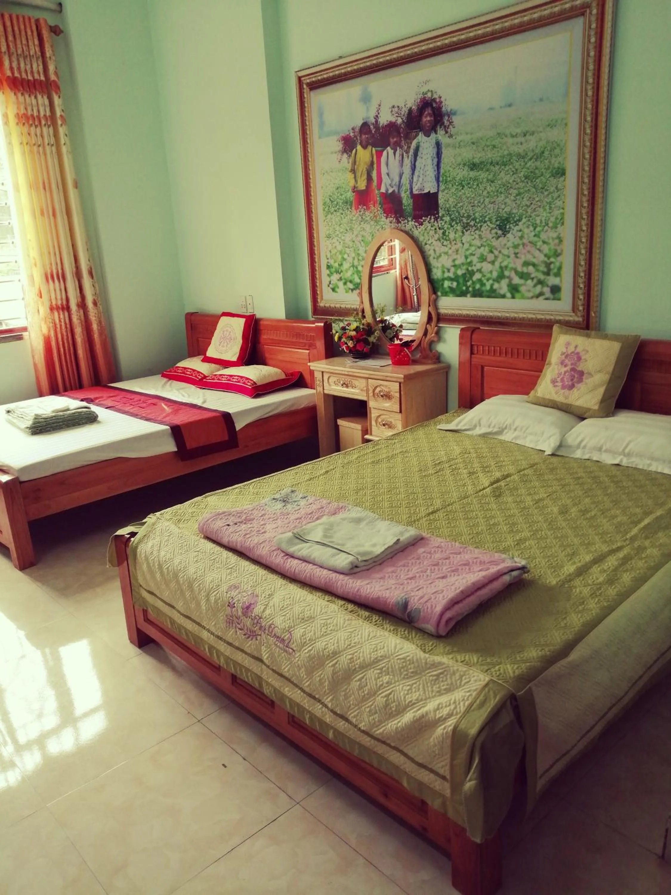 Bed in Yen Minh Hotel Thien An