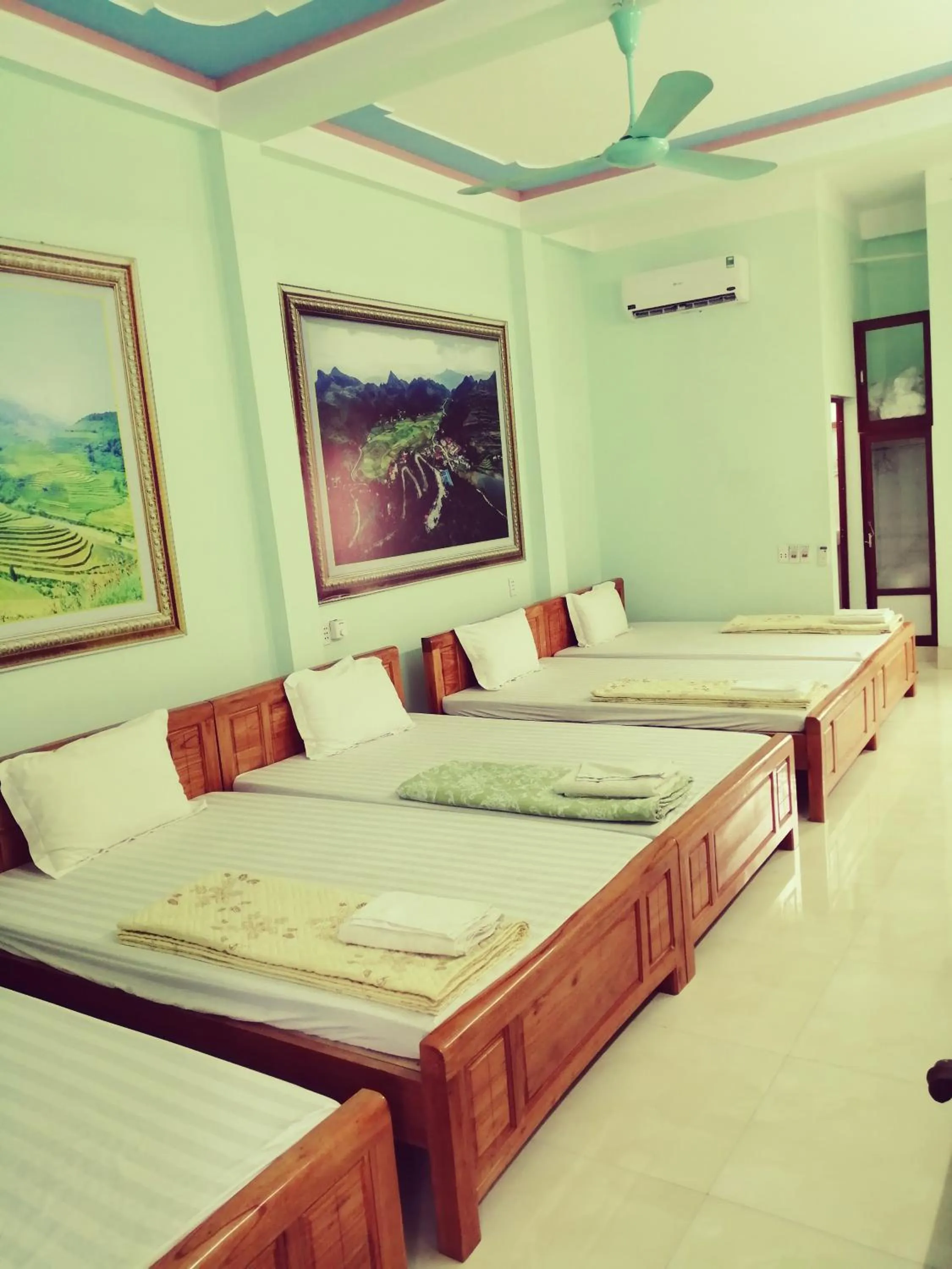 Bed in Yen Minh Hotel Thien An