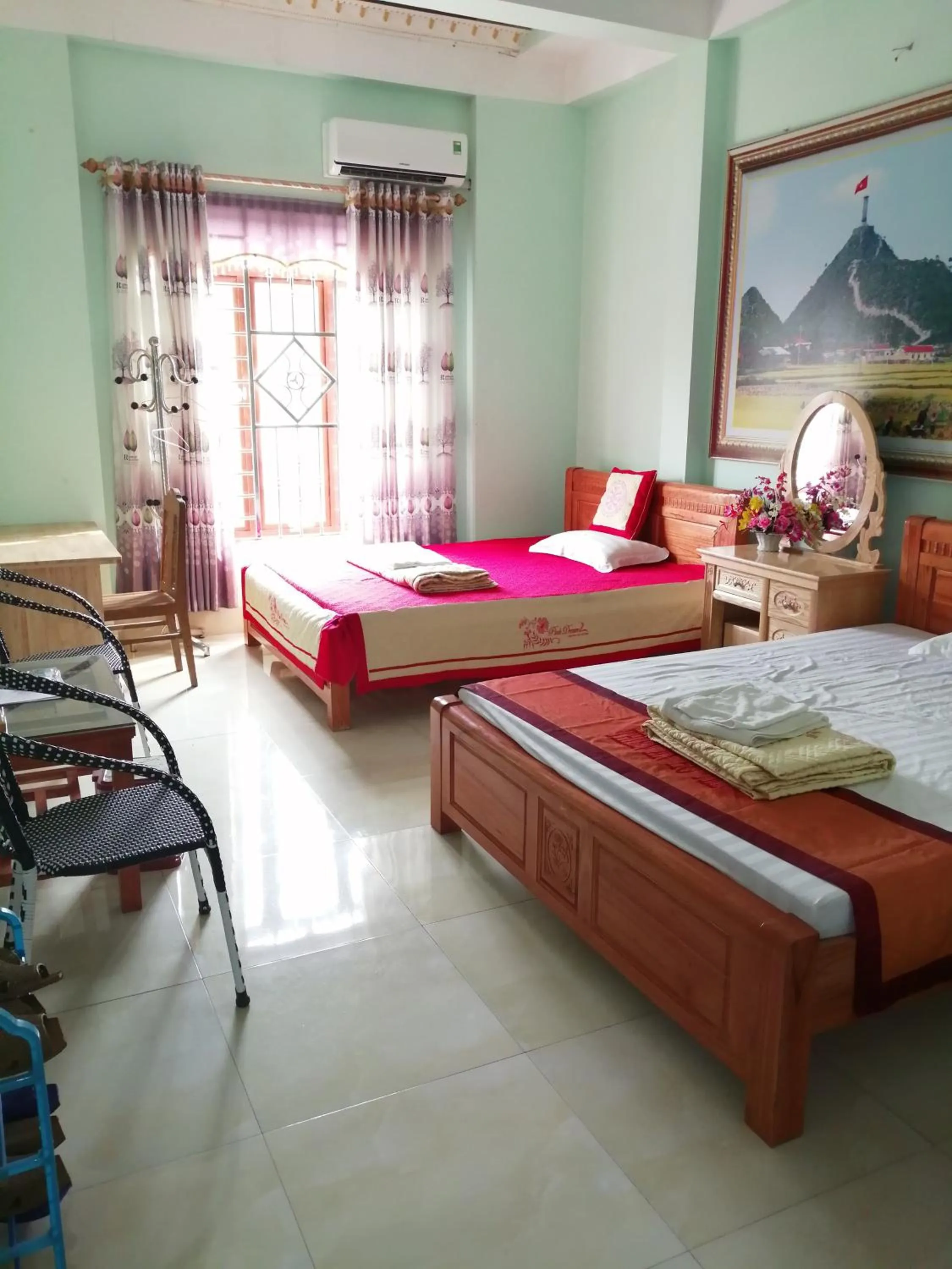 Bed in Yen Minh Hotel Thien An