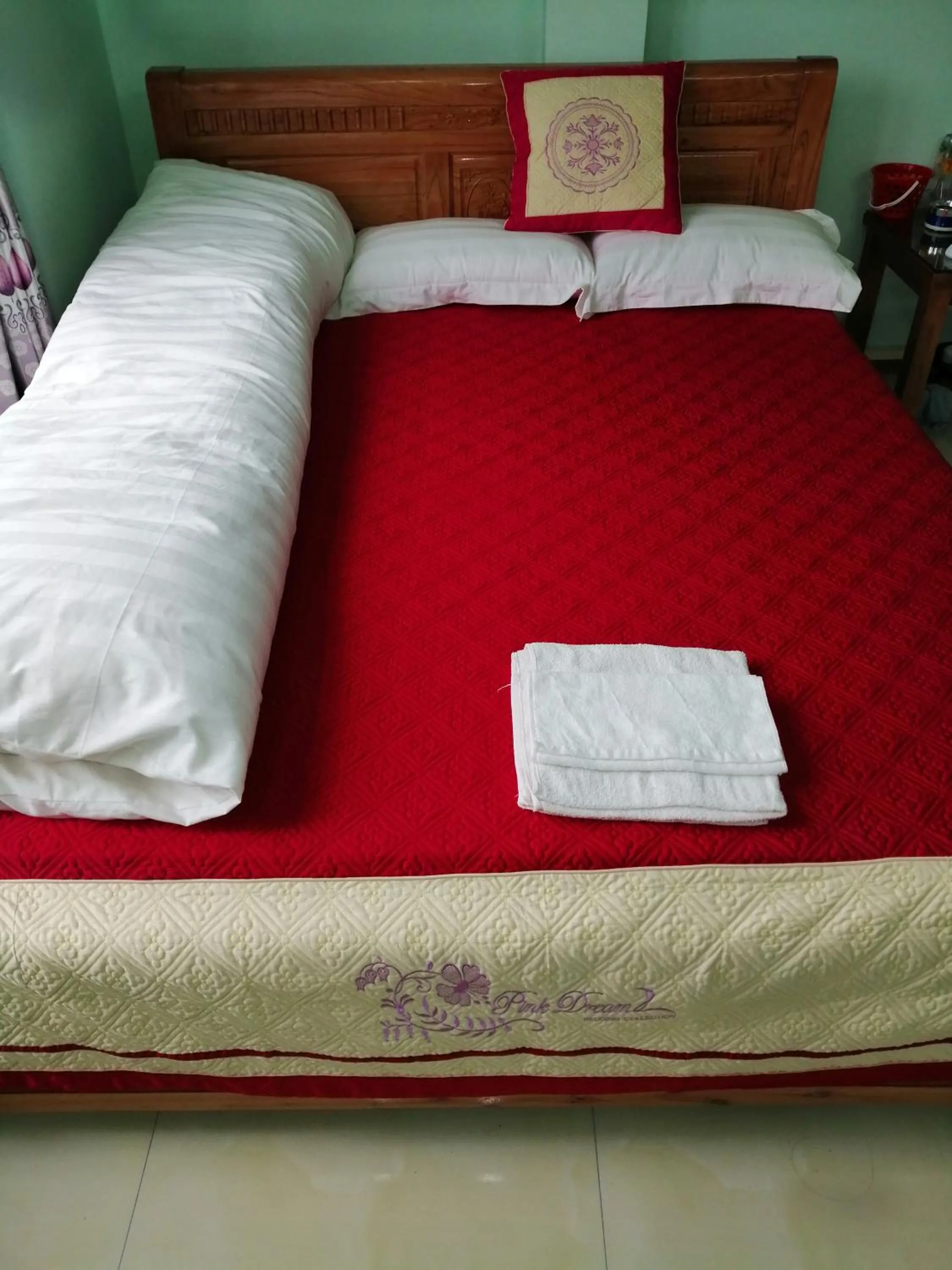 Bed in Yen Minh Hotel Thien An