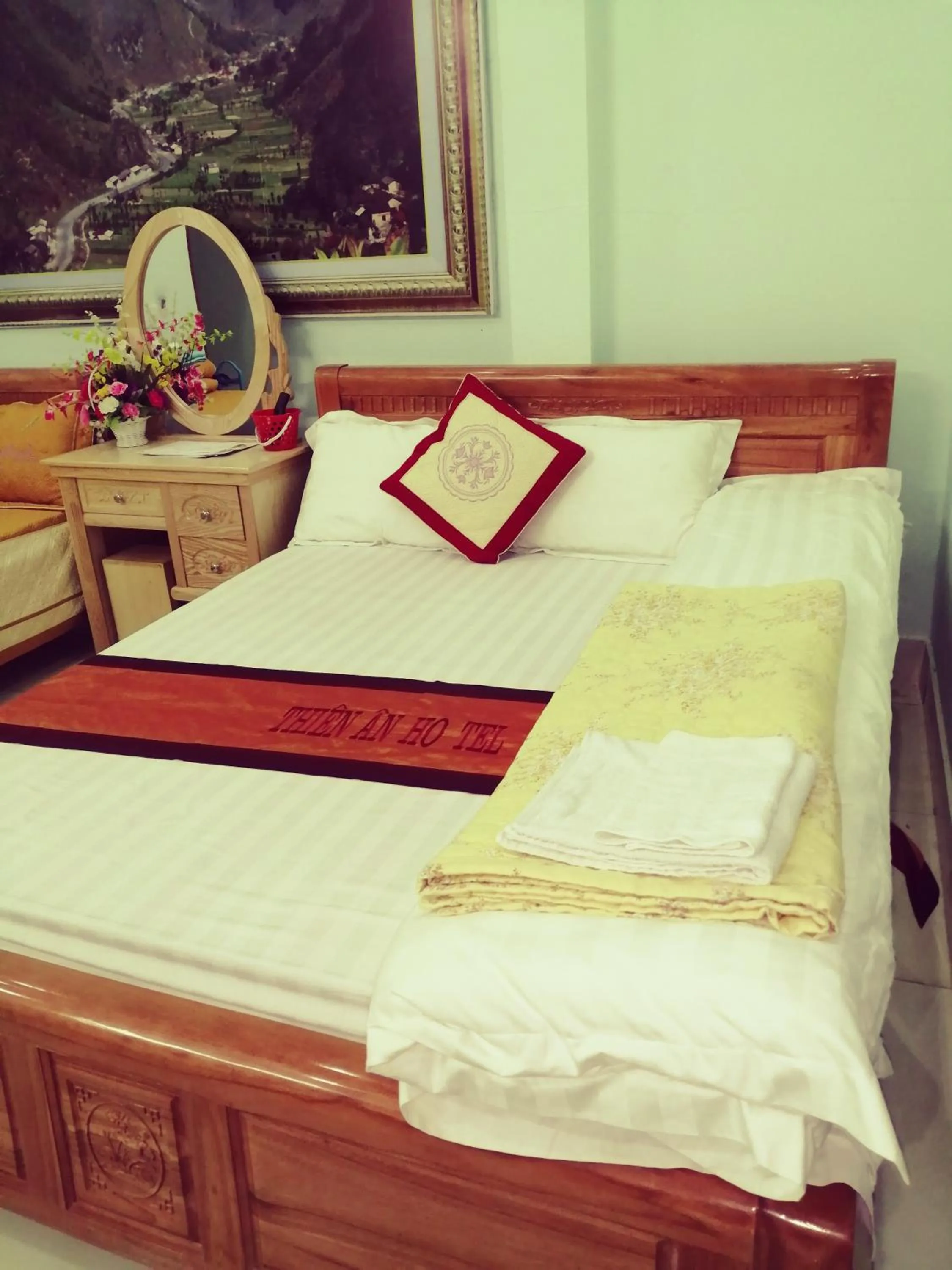 Bed in Yen Minh Hotel Thien An