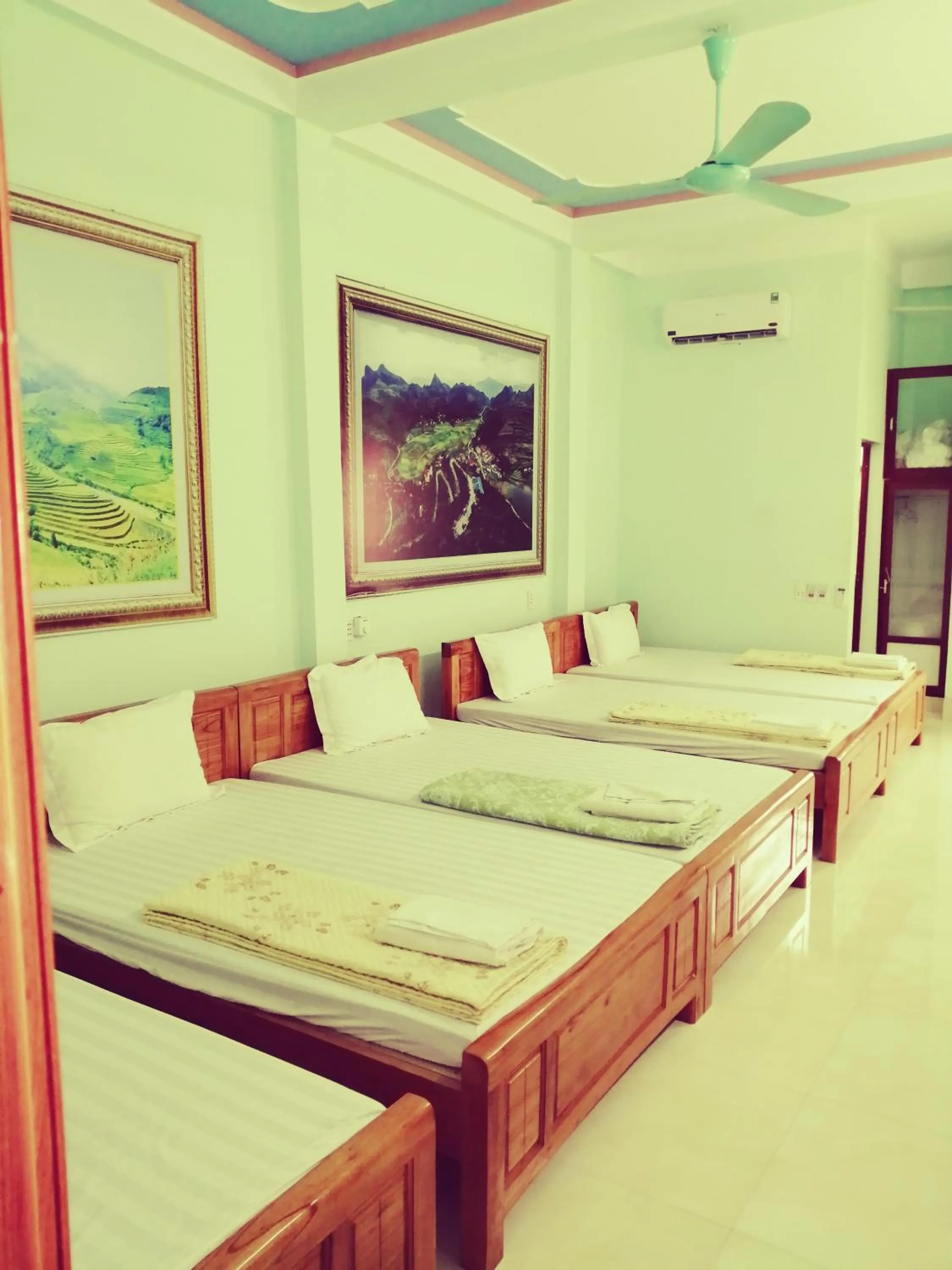Bed in Yen Minh Hotel Thien An