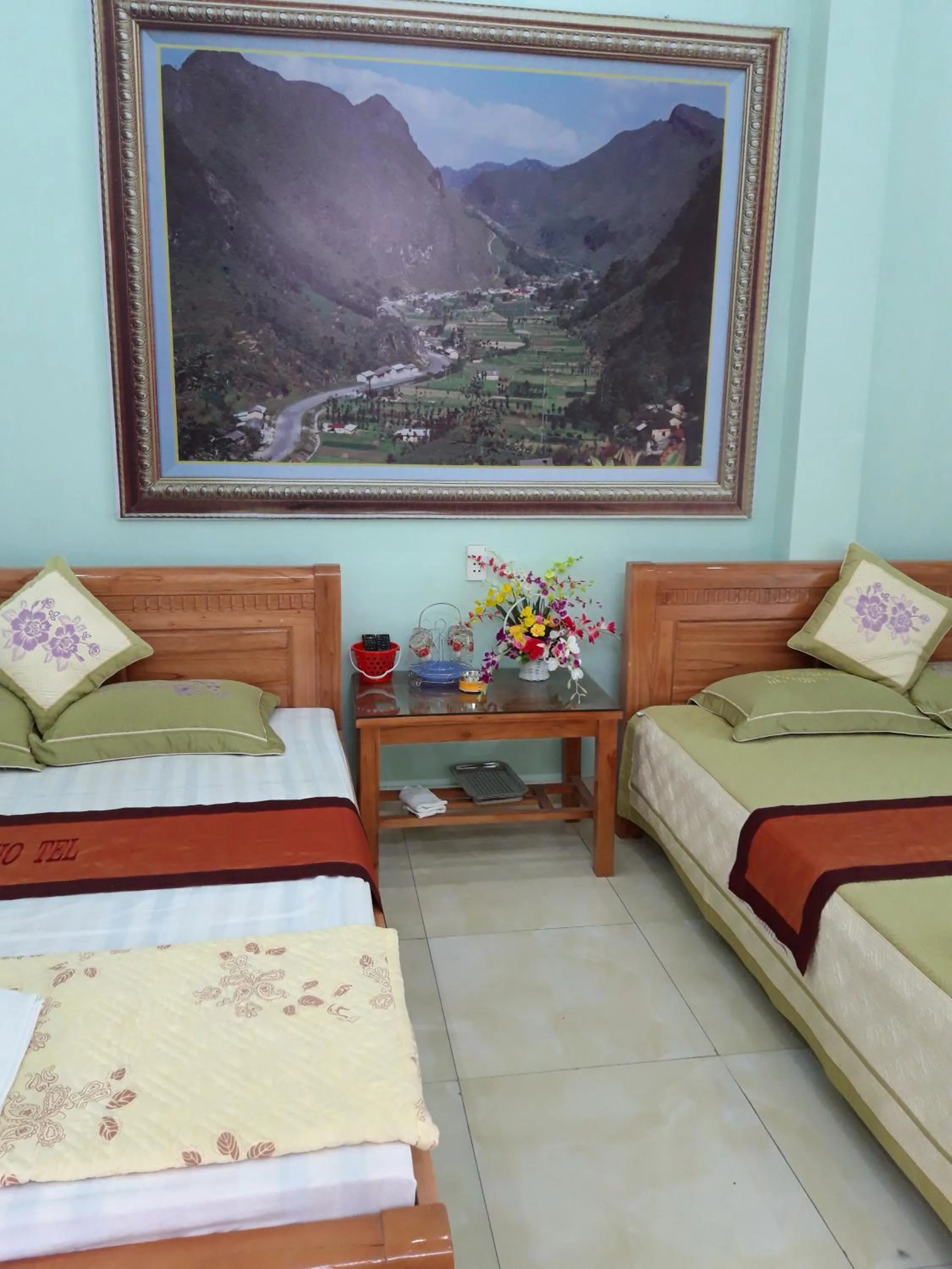 Bed in Yen Minh Hotel Thien An