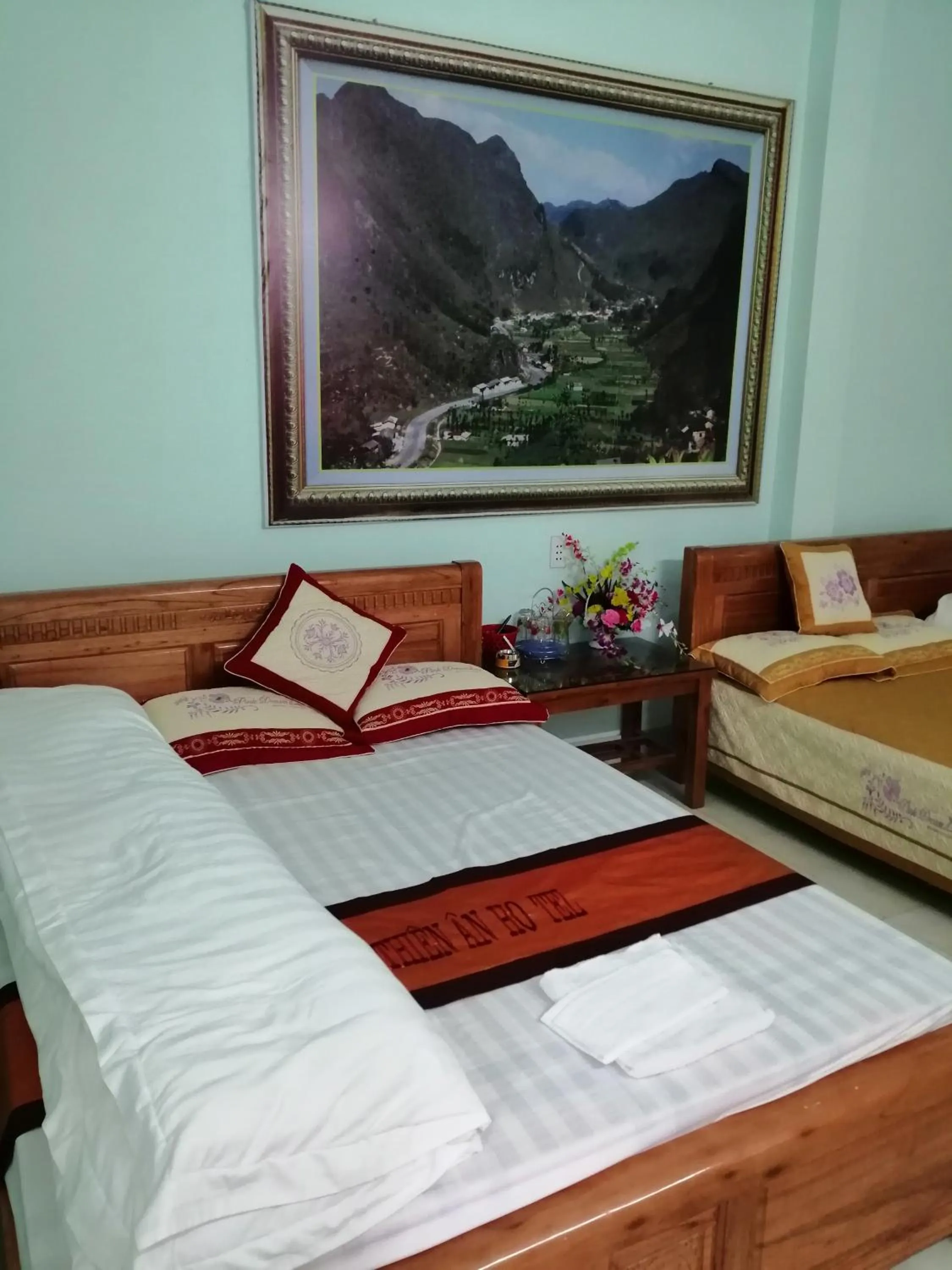 Bed in Yen Minh Hotel Thien An