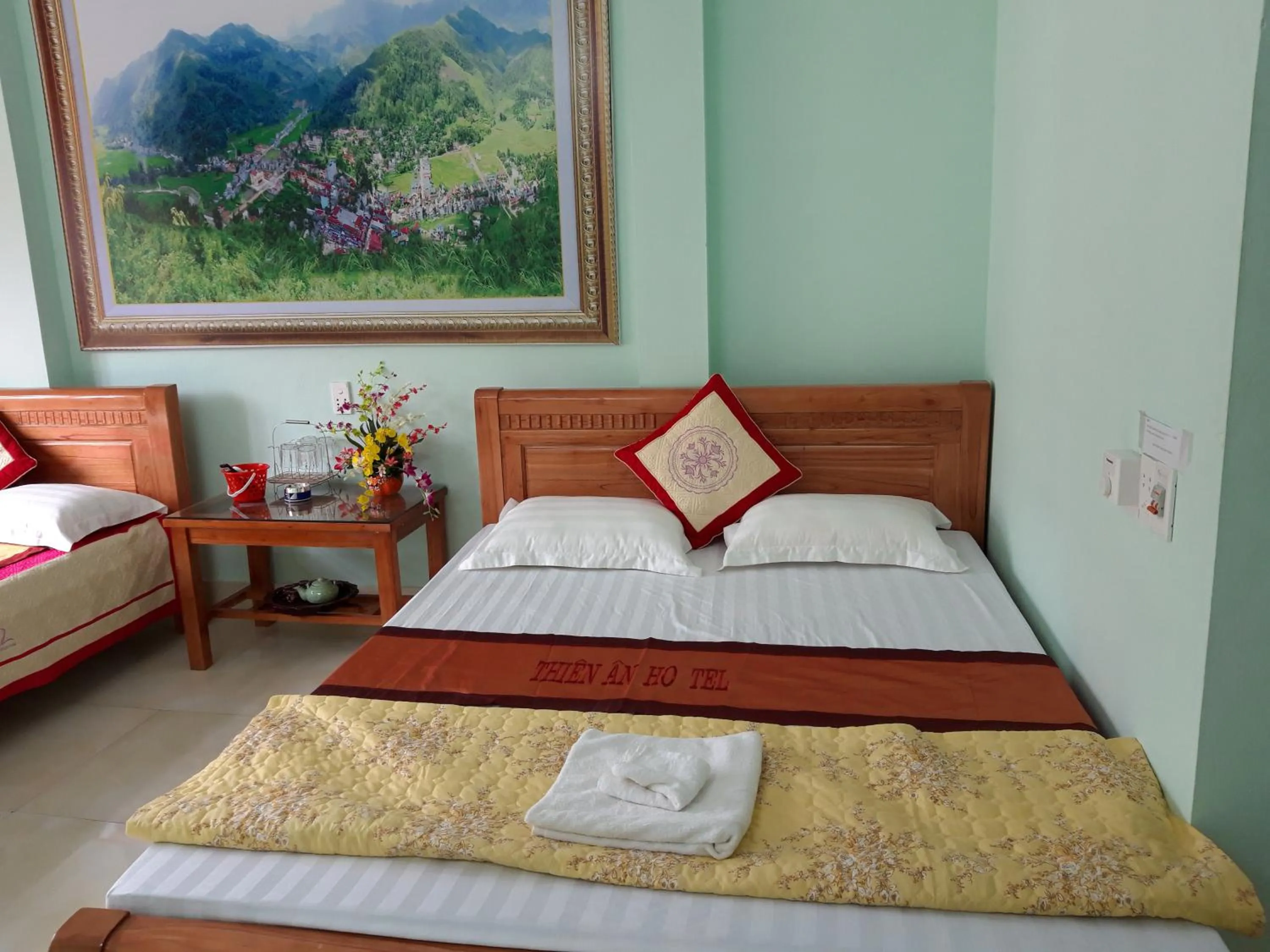 Bed in Yen Minh Hotel Thien An