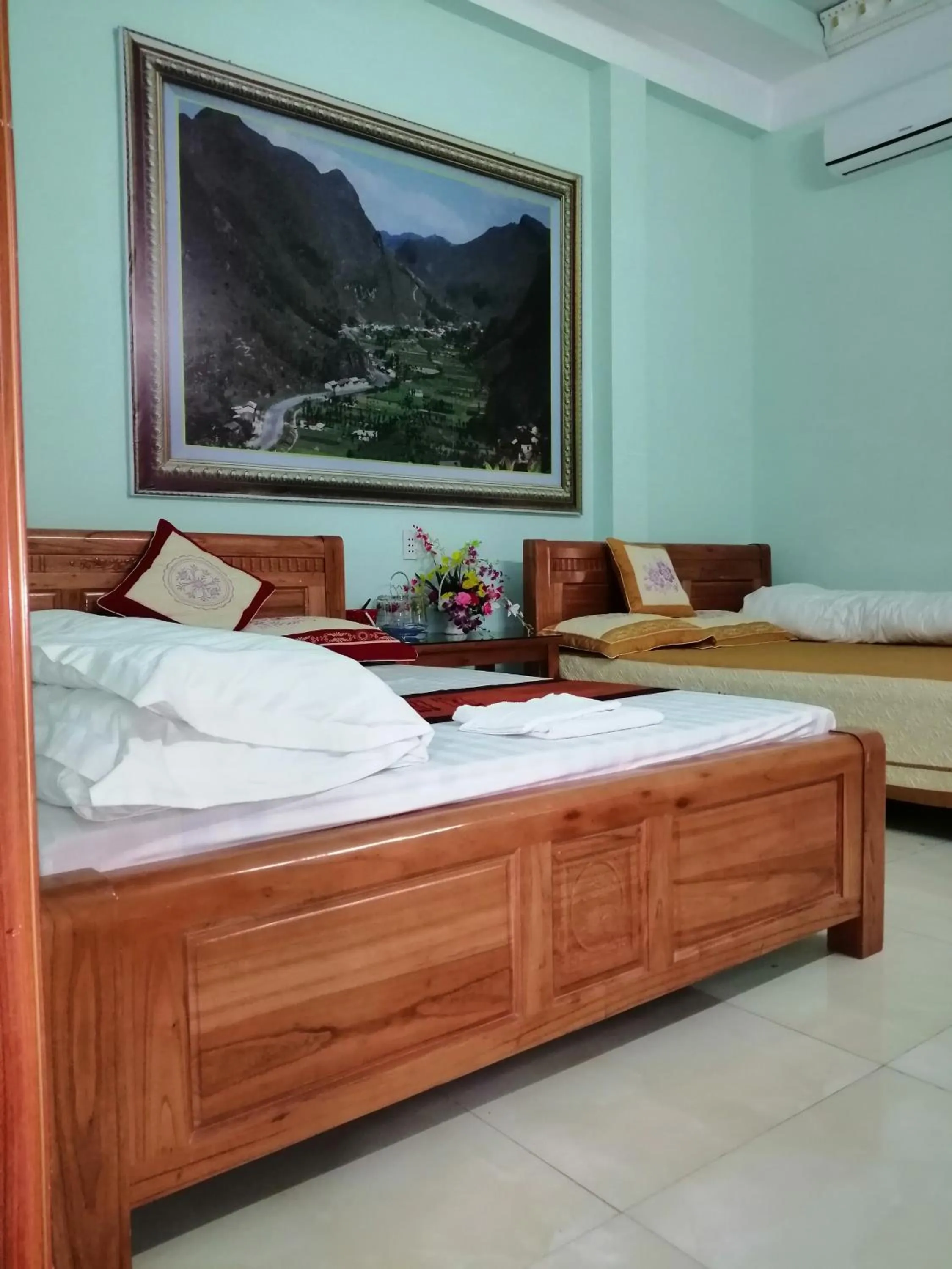 Bed in Yen Minh Hotel Thien An