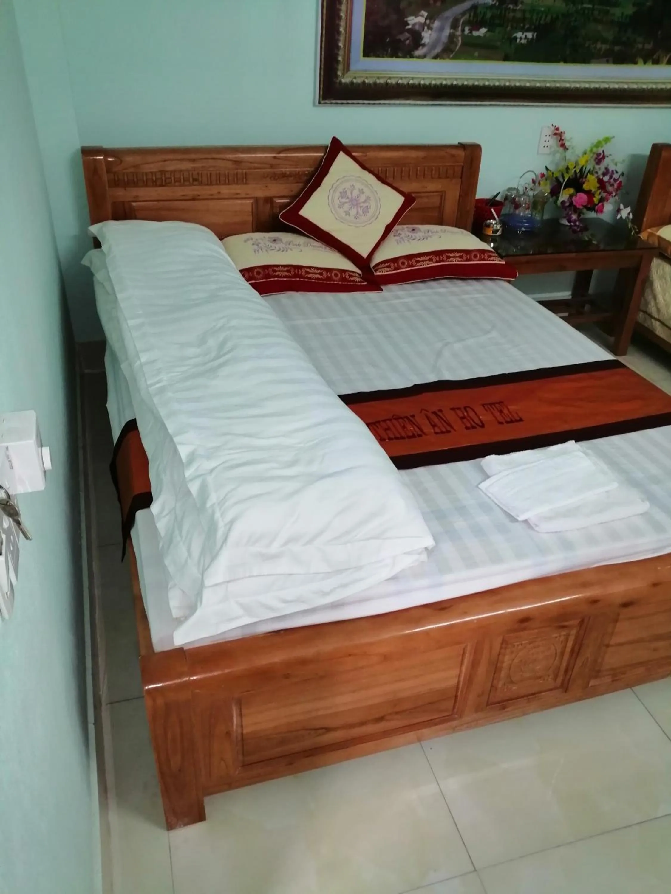 Bed in Yen Minh Hotel Thien An