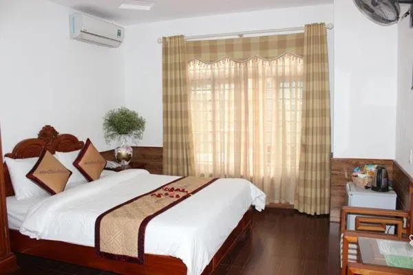 Bed in Yen Minh Hotel Thien An