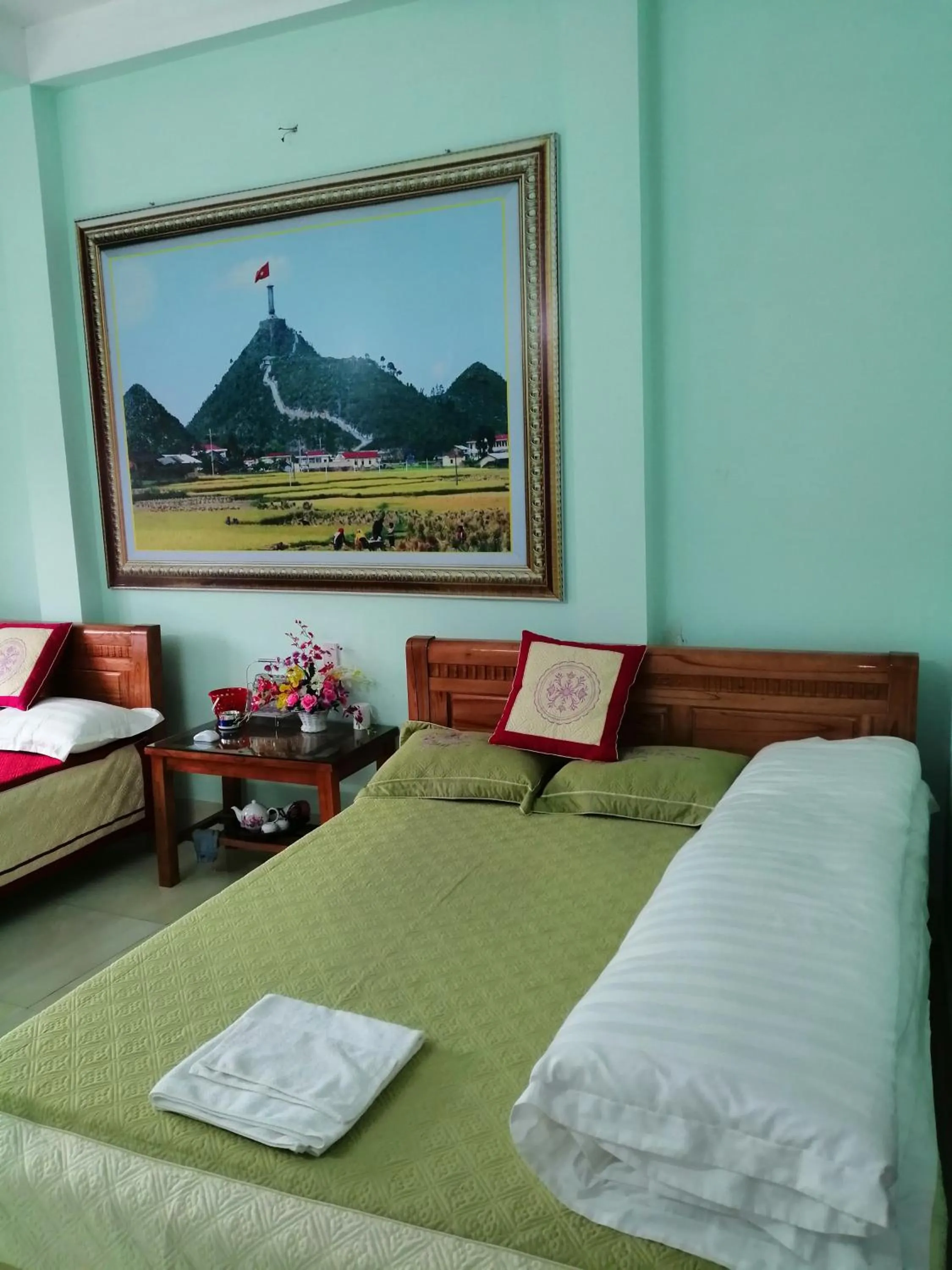 Bed in Yen Minh Hotel Thien An