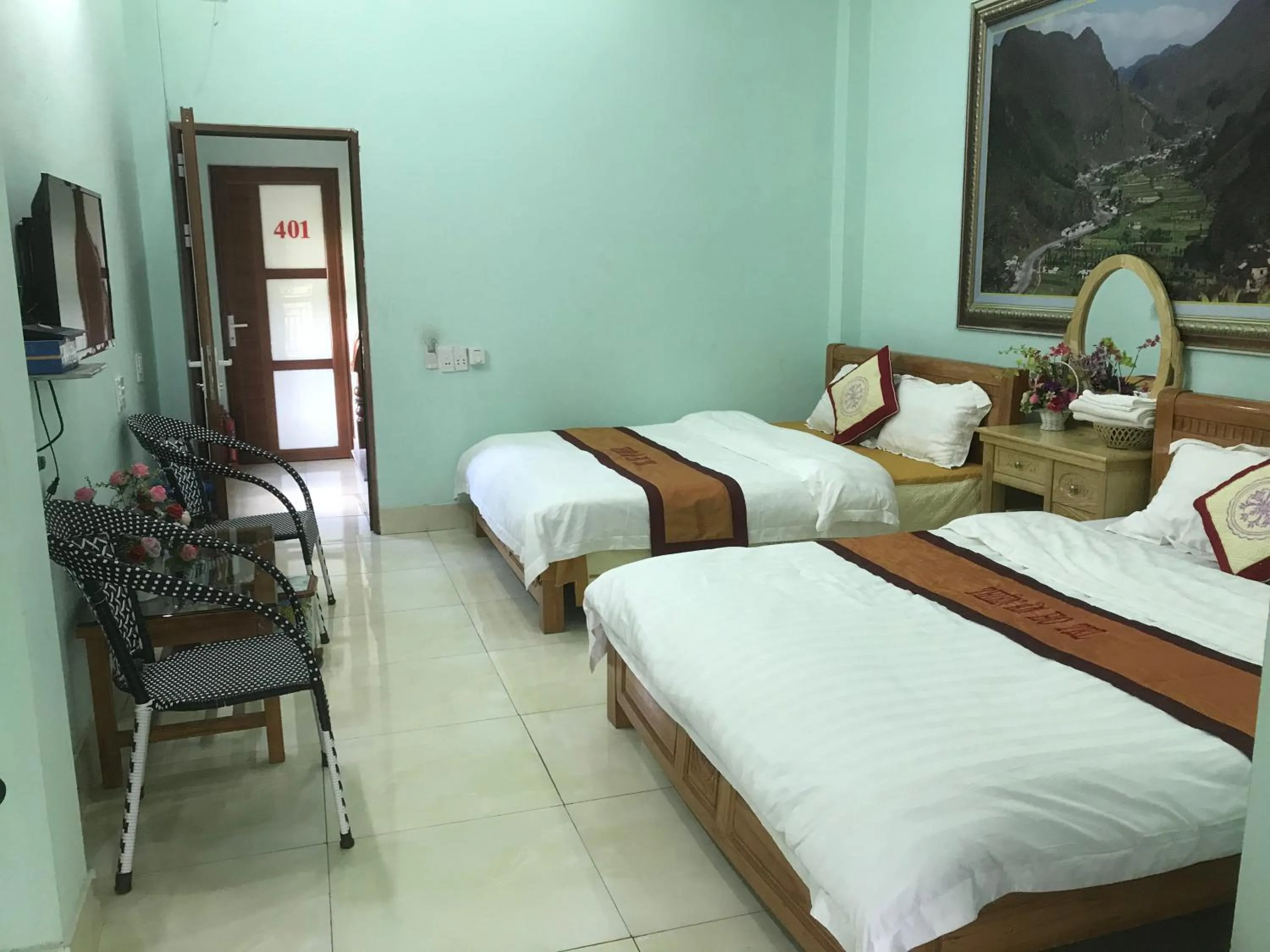 Bed in Yen Minh Hotel Thien An