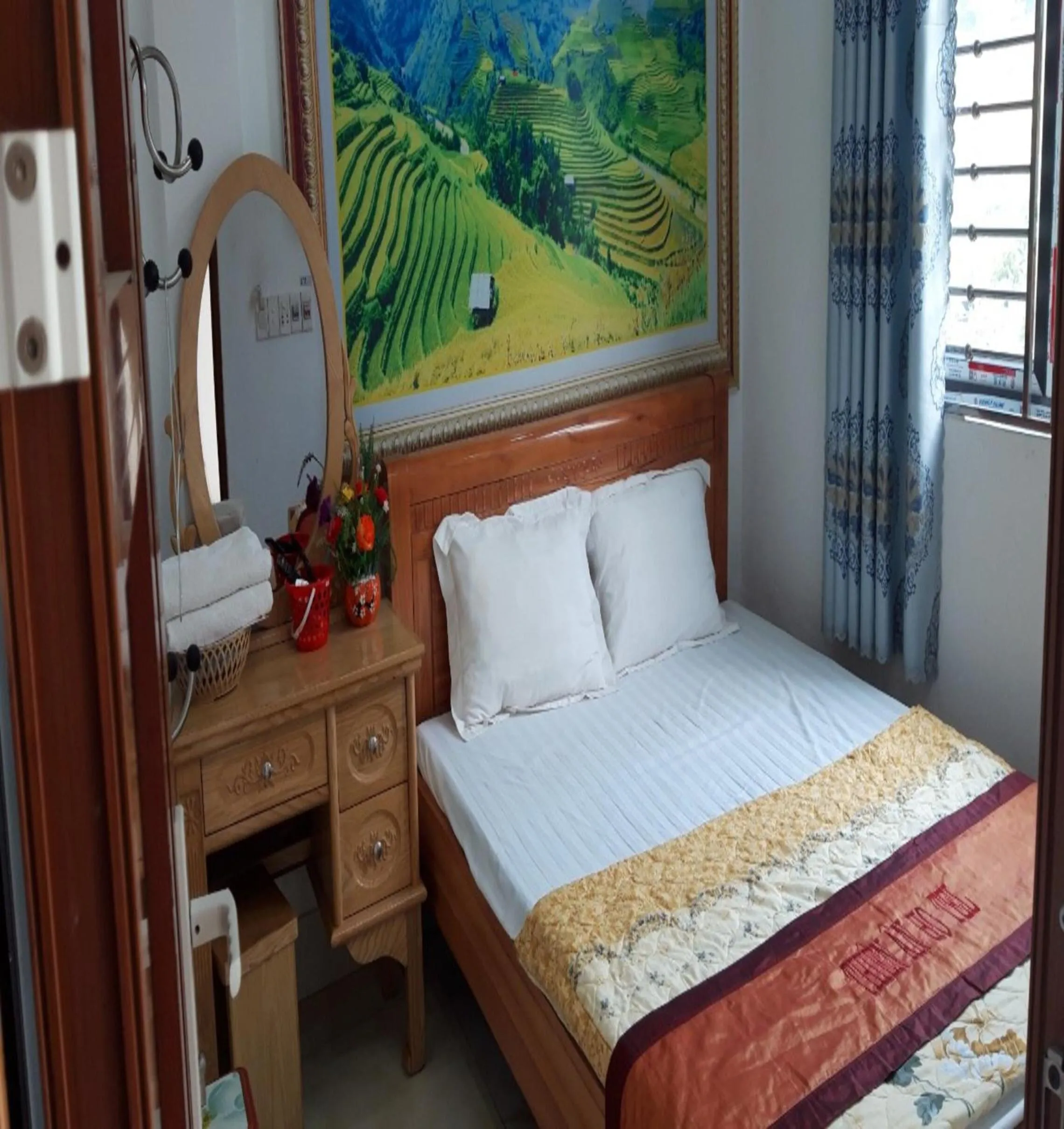 Bed in Yen Minh Hotel Thien An