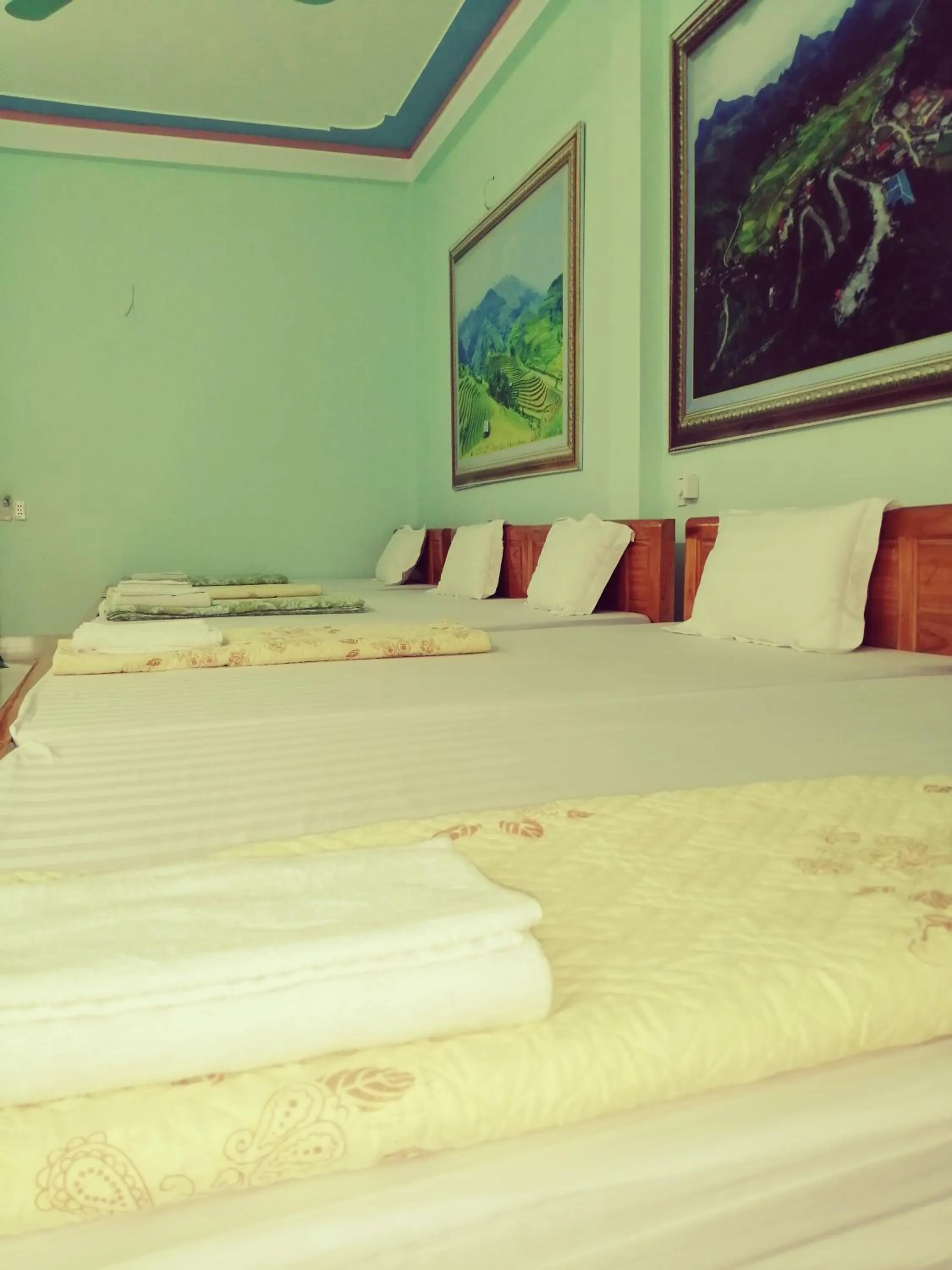 Bed in Yen Minh Hotel Thien An