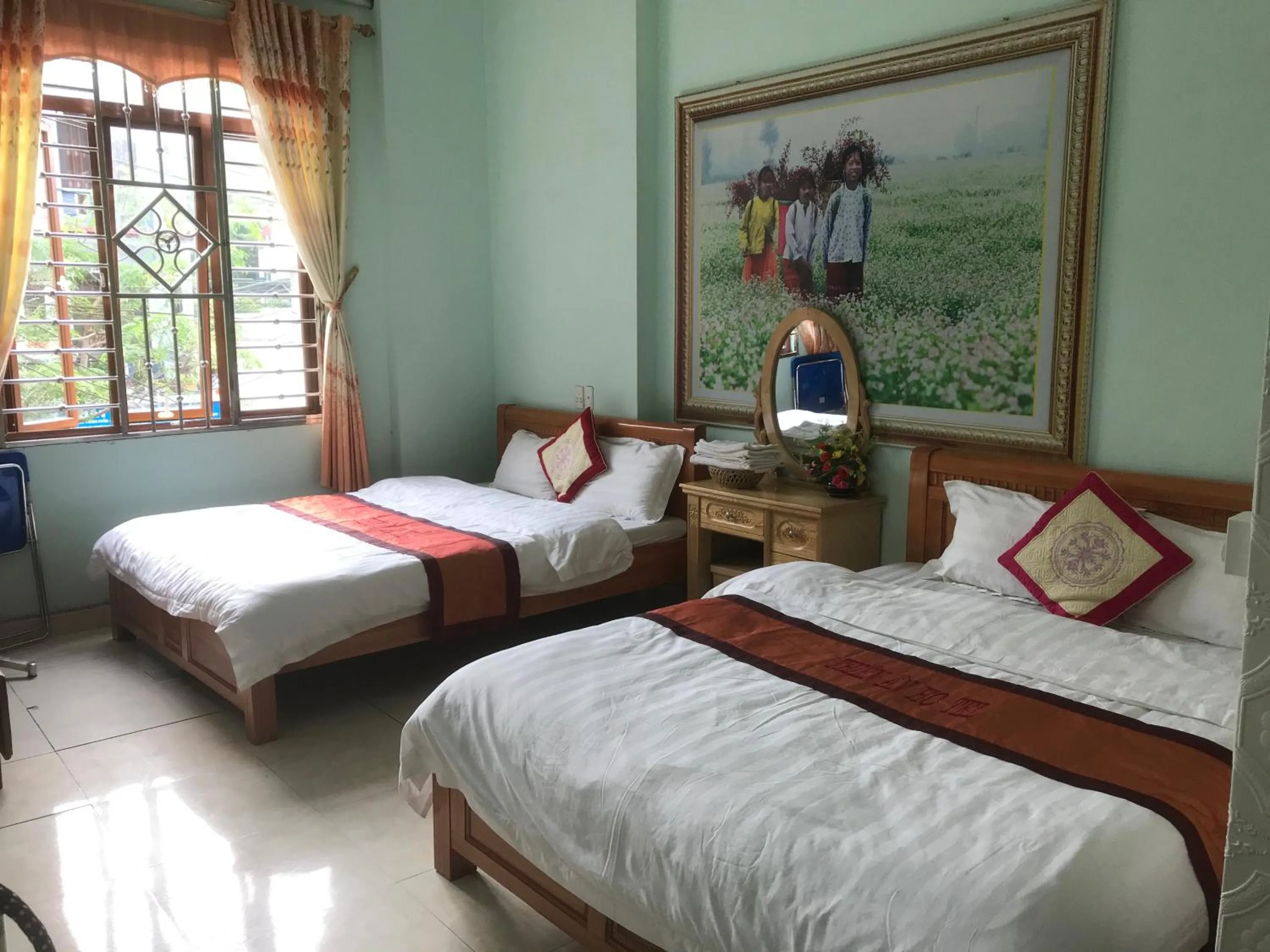 Bed in Yen Minh Hotel Thien An