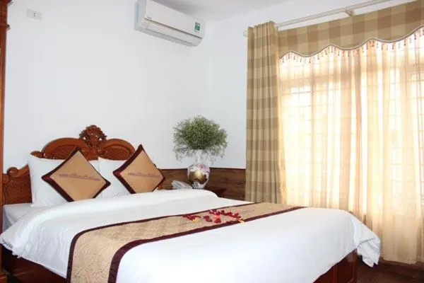 Bed in Yen Minh Hotel Thien An