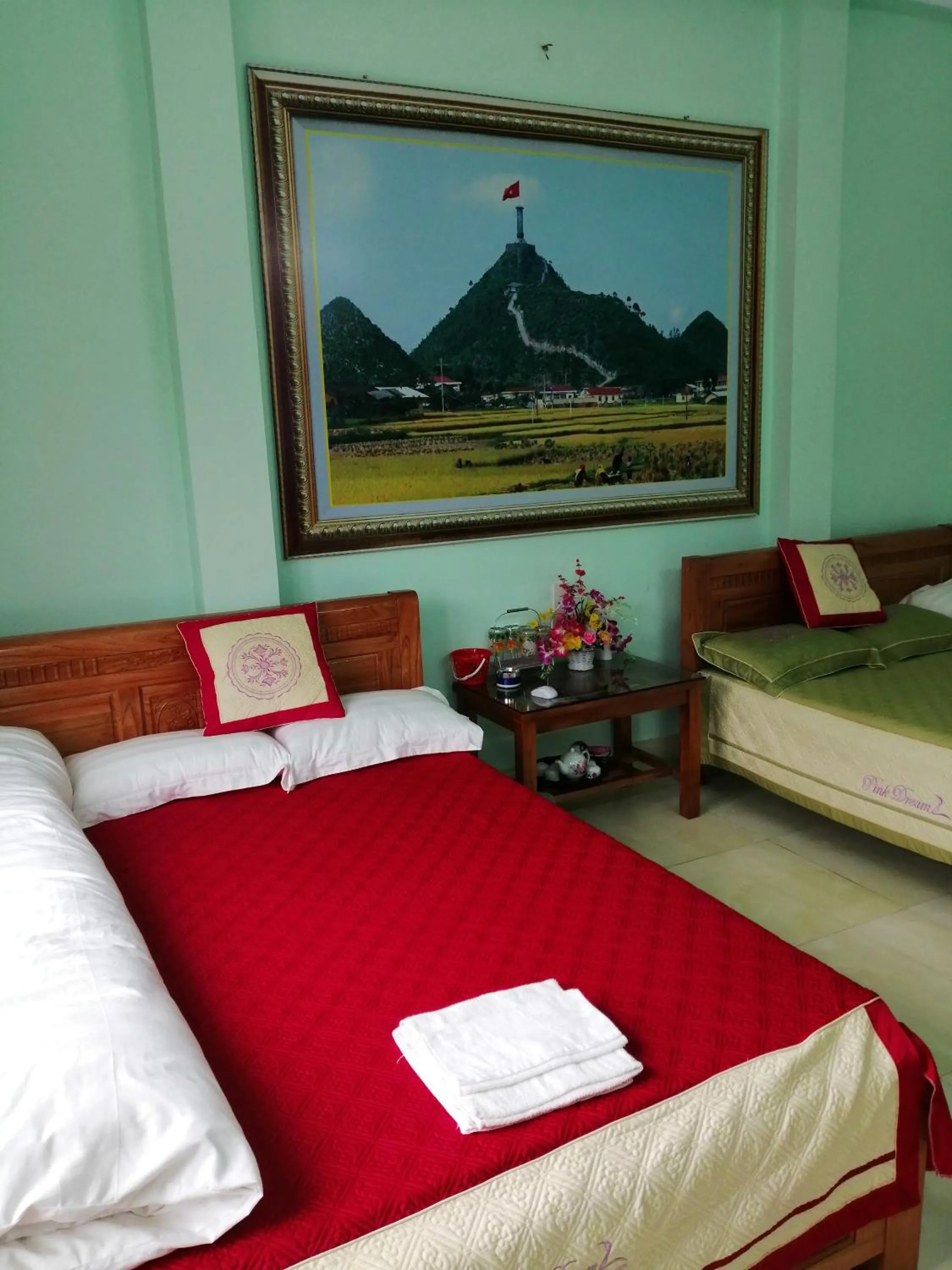 Bed in Yen Minh Hotel Thien An