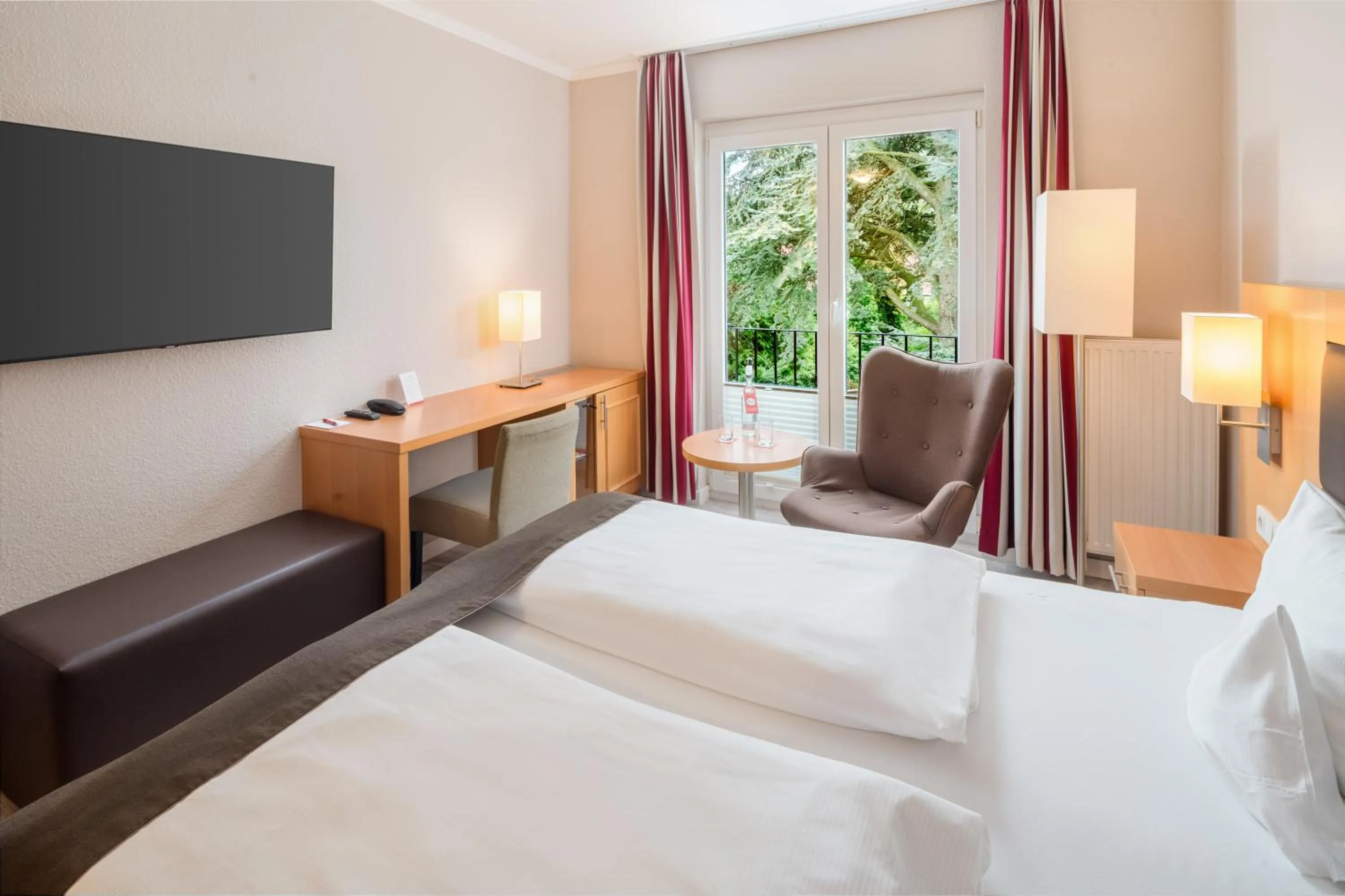 Photo of the whole room, Bed in Moin Hotel Cuxhaven