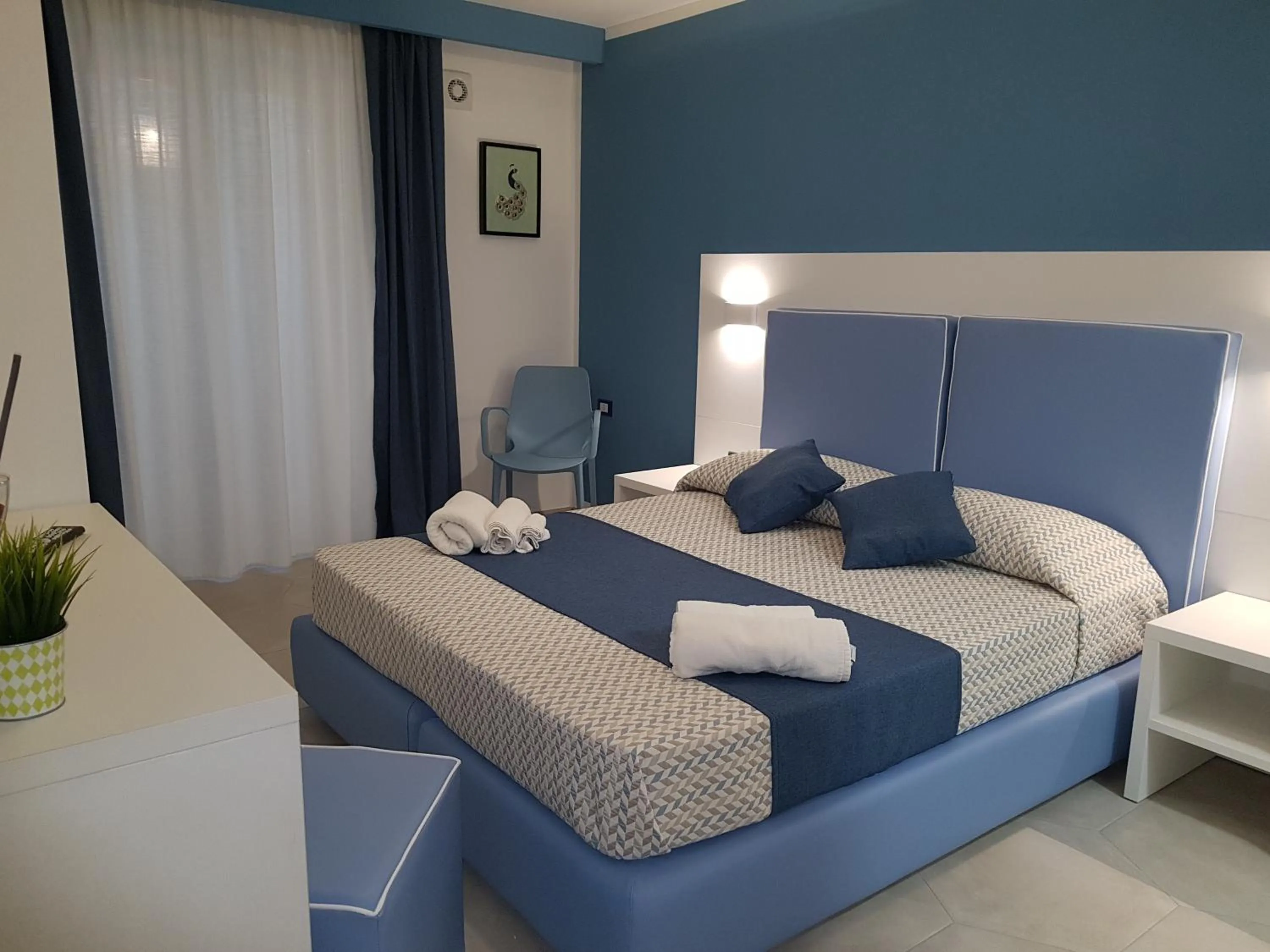 Bed in B&B Aloe Comfort Rooms