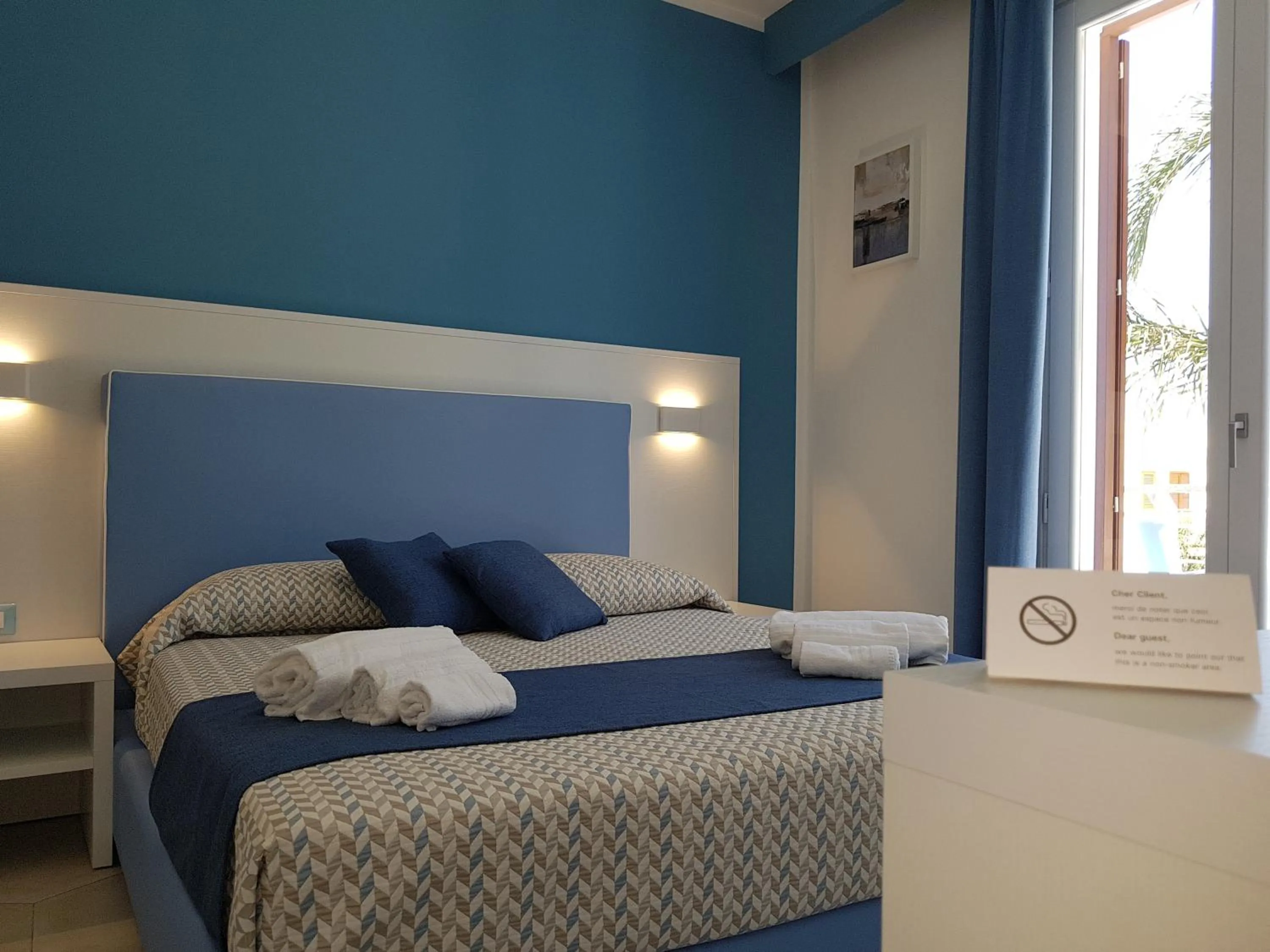 Bed in B&B Aloe Comfort Rooms