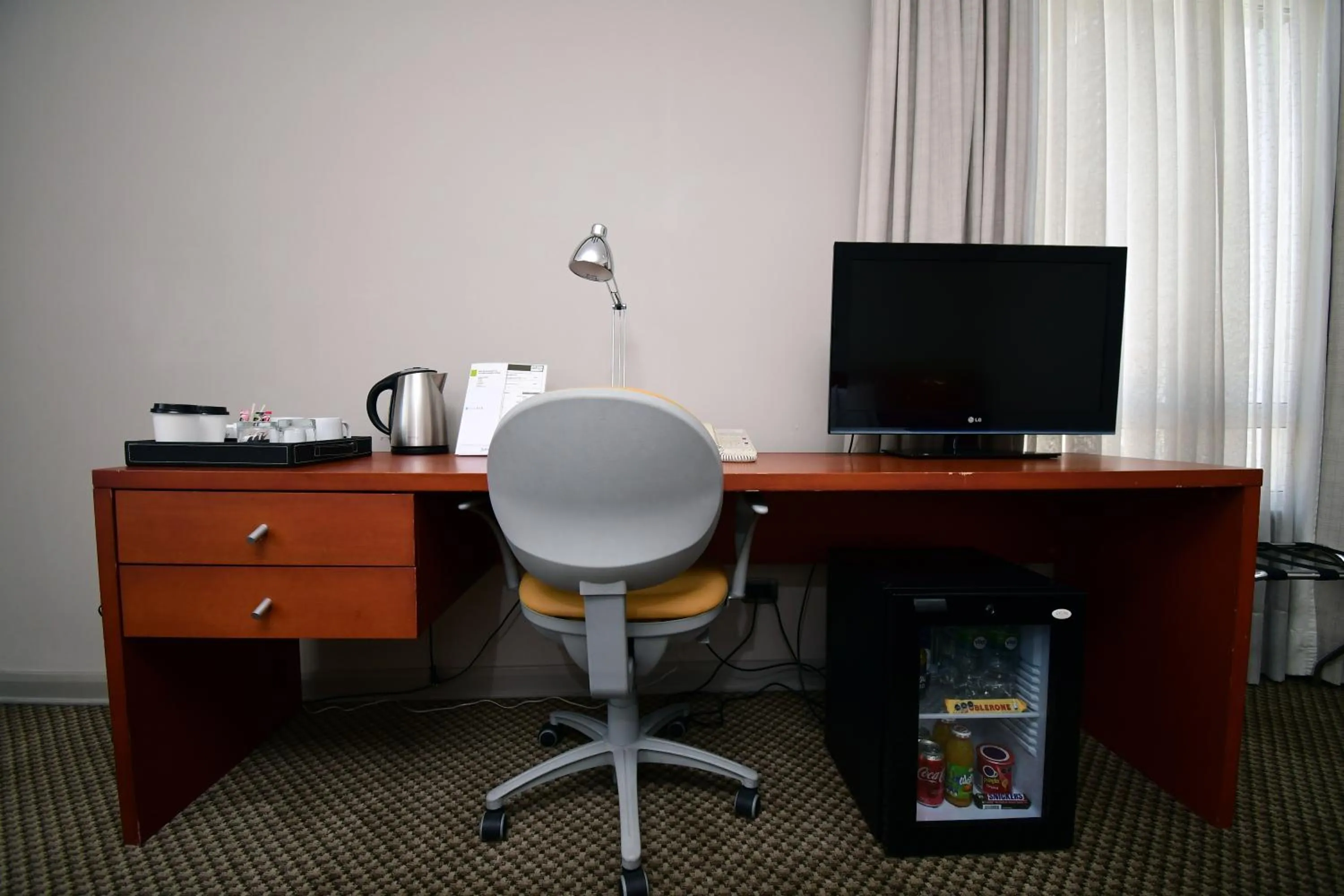 Seating area, TV/Entertainment Center in Radisson Ciudad Empresarial Santiago