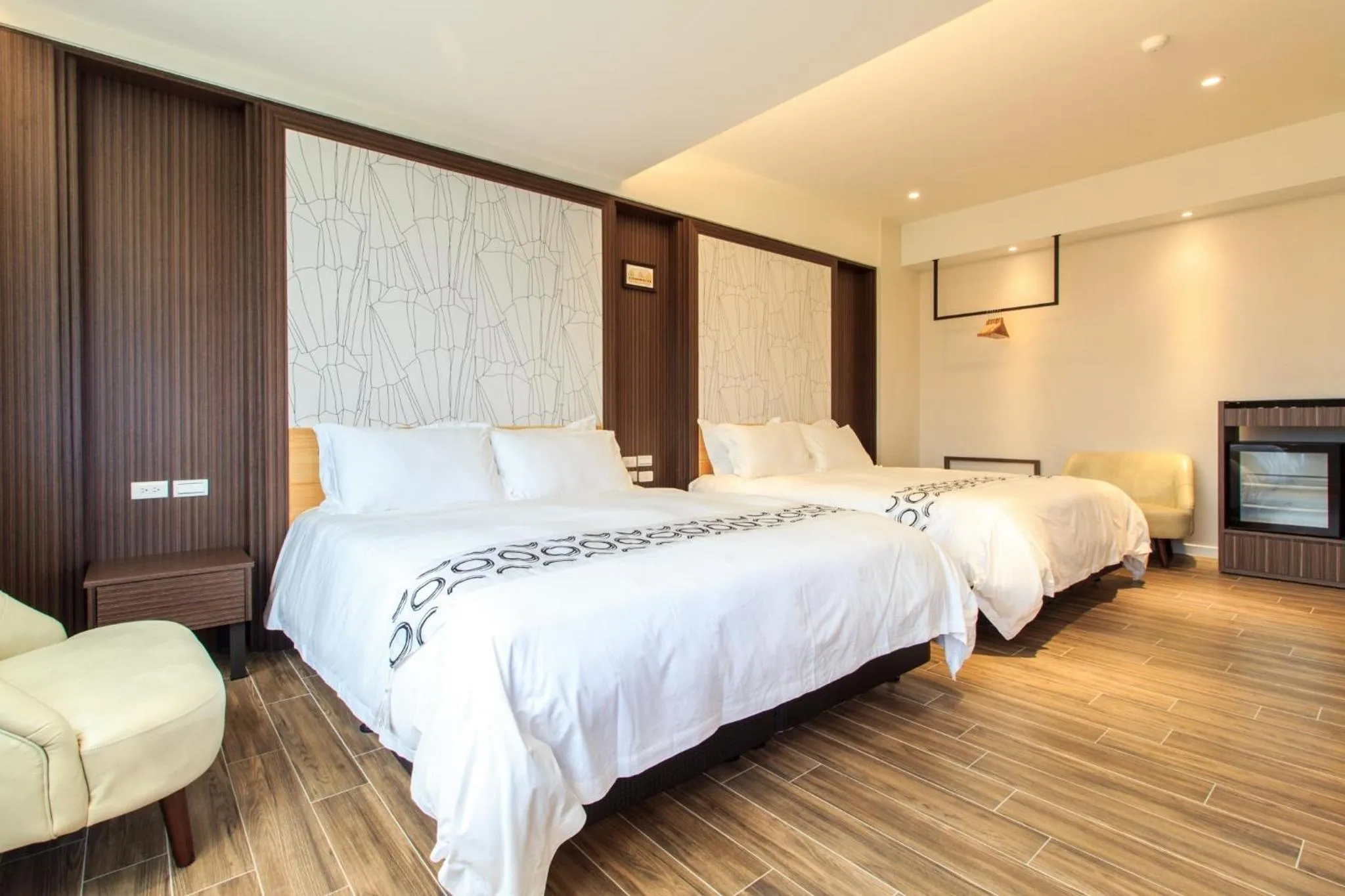 Bed in Urban Oasis Inn