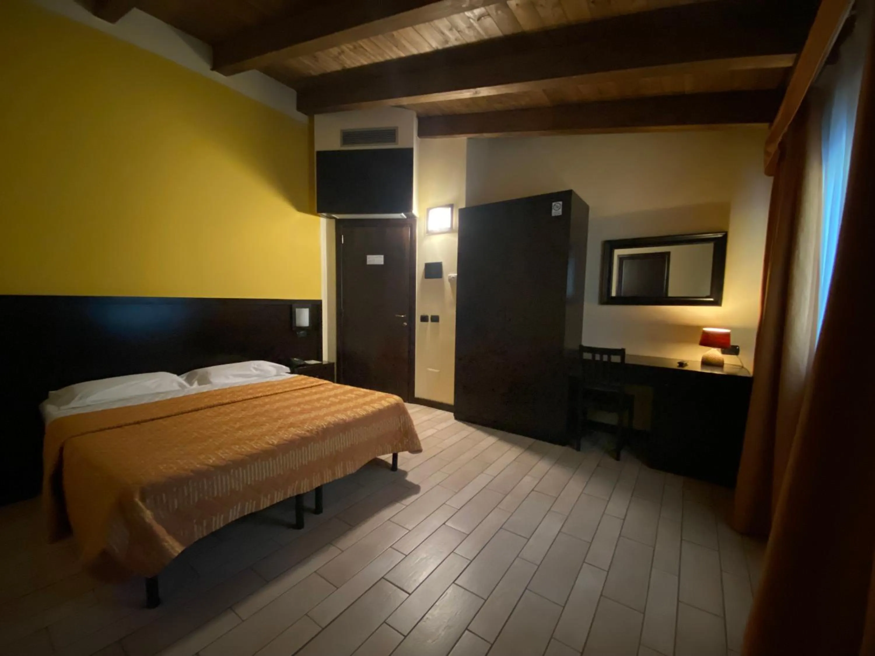 Bed in AgriHotel Papaya