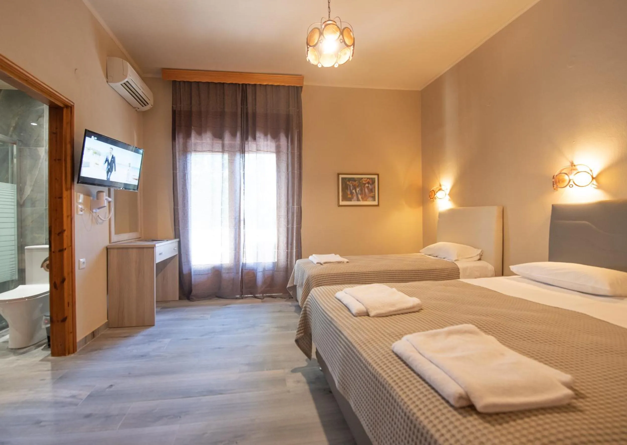 Bed in Yannis Hotel