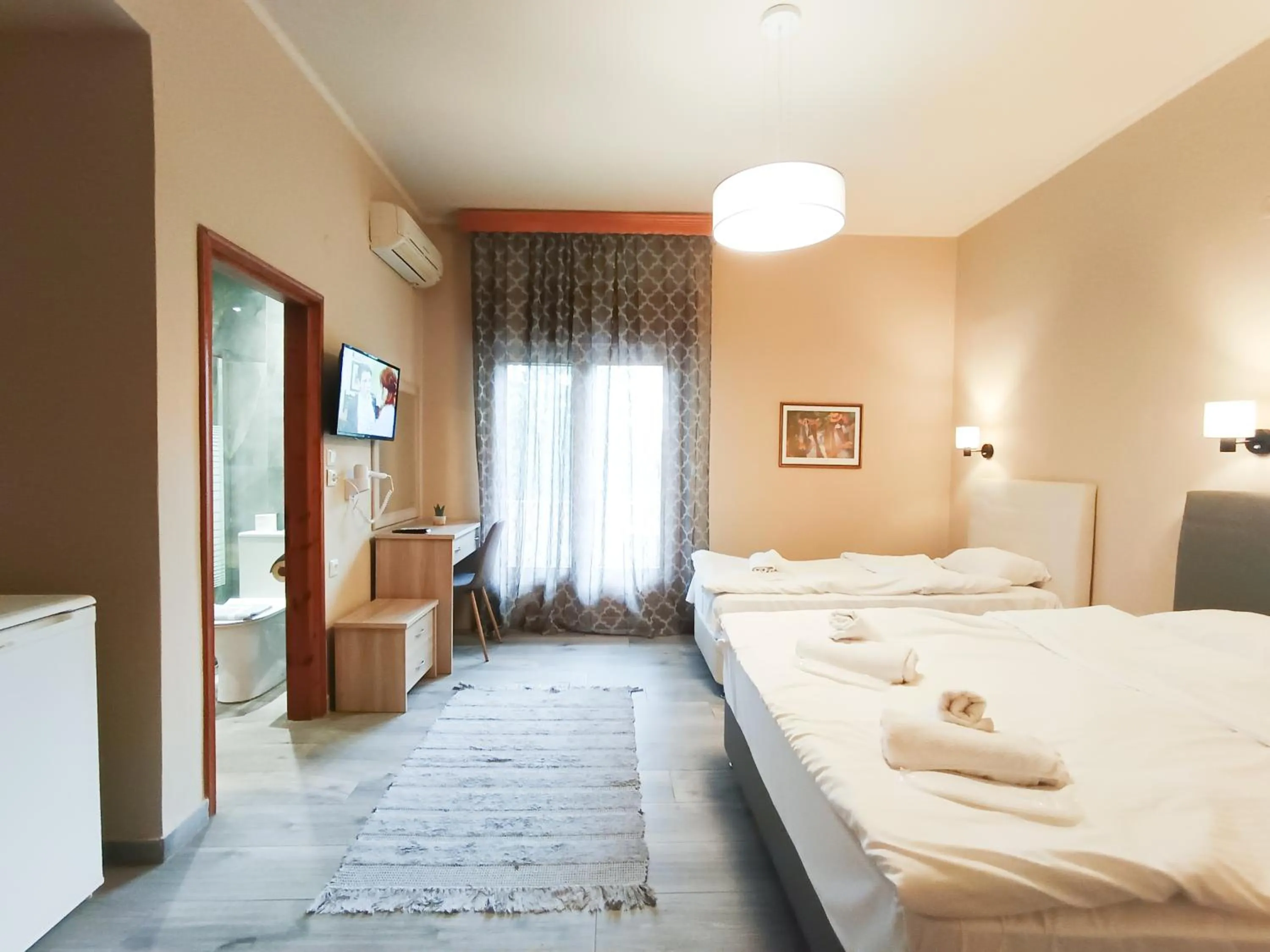 Bed in Yannis Hotel