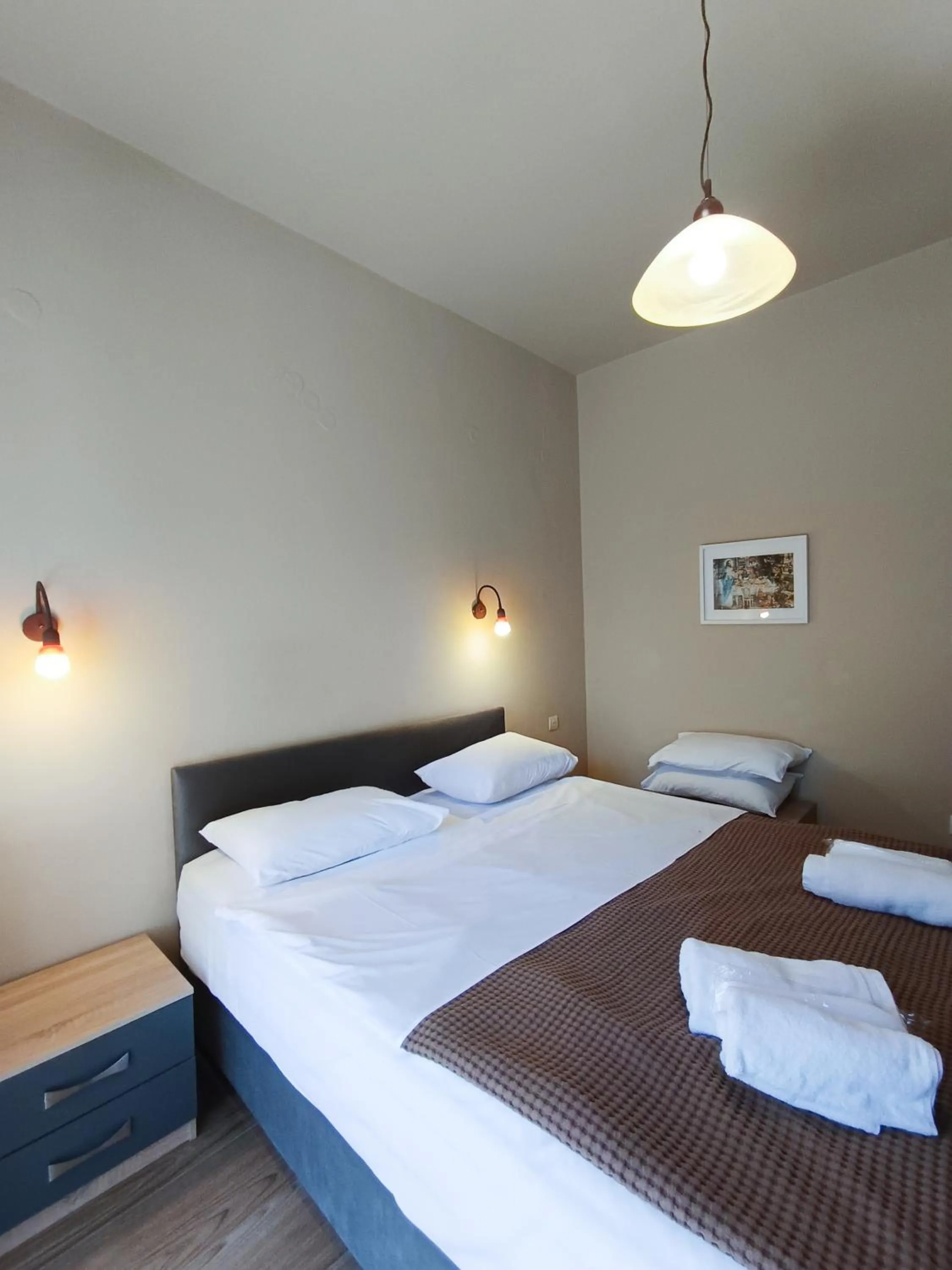 Bed in Yannis Hotel