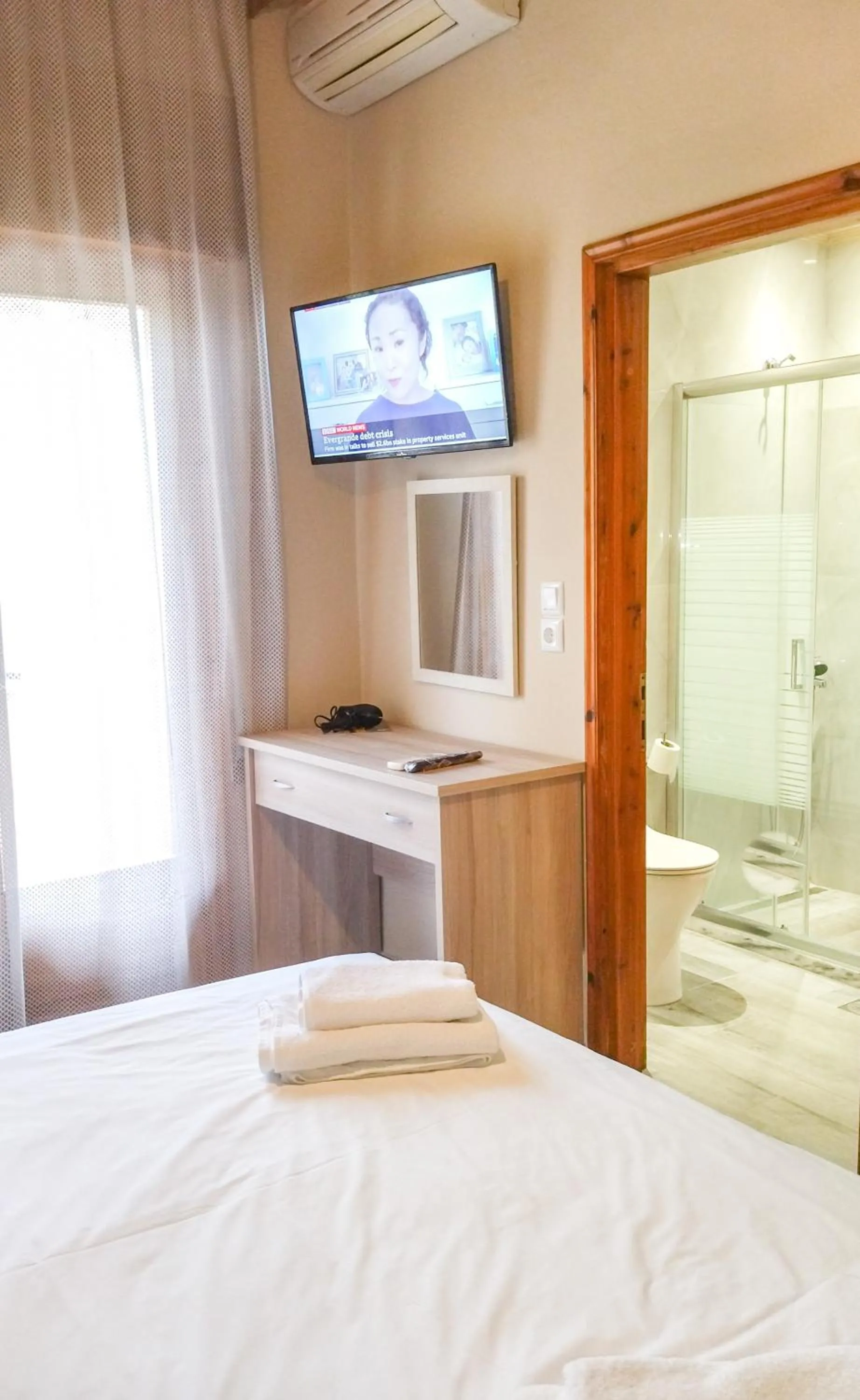 Bed in Yannis Hotel