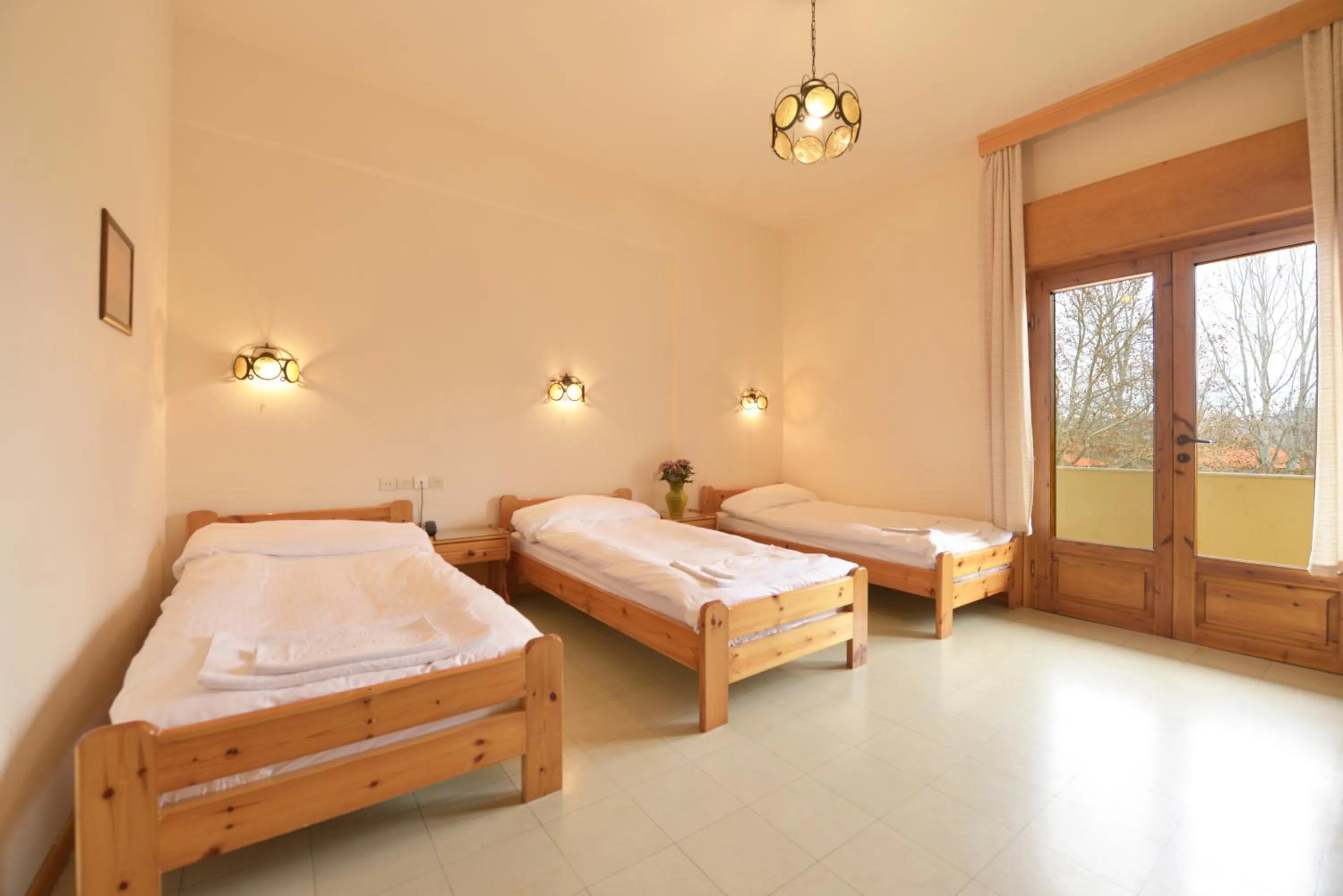 Bed in Yannis Hotel
