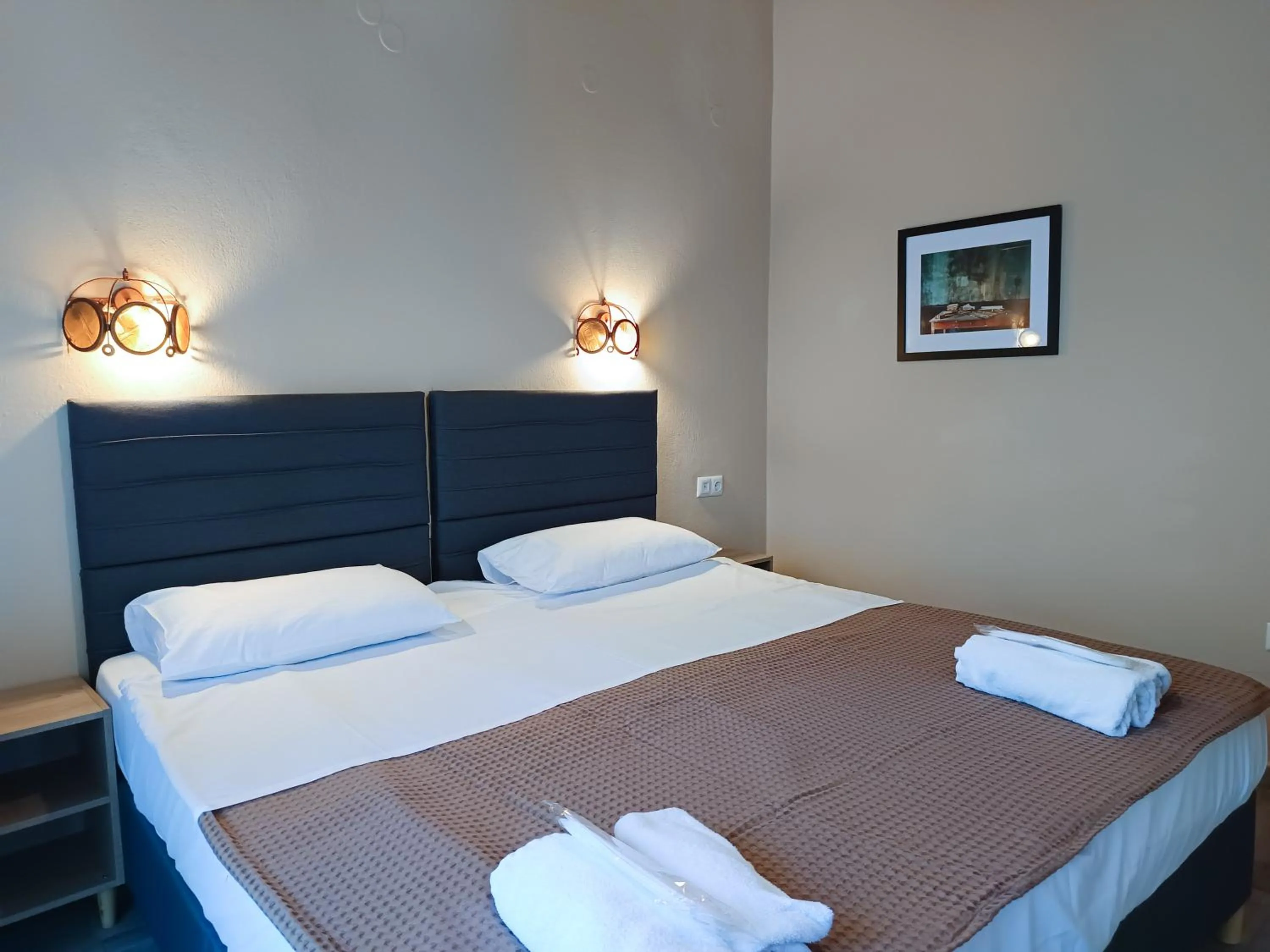 Bed in Yannis Hotel