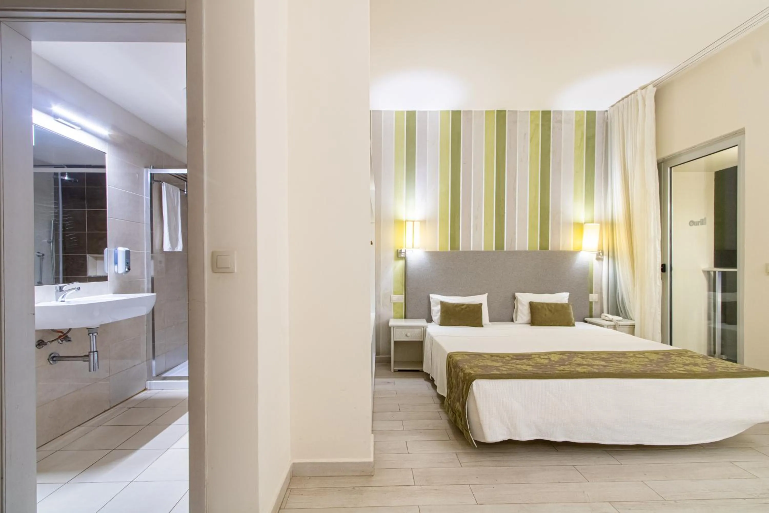 Toilet, Bed in Ouril Hotel Agueda