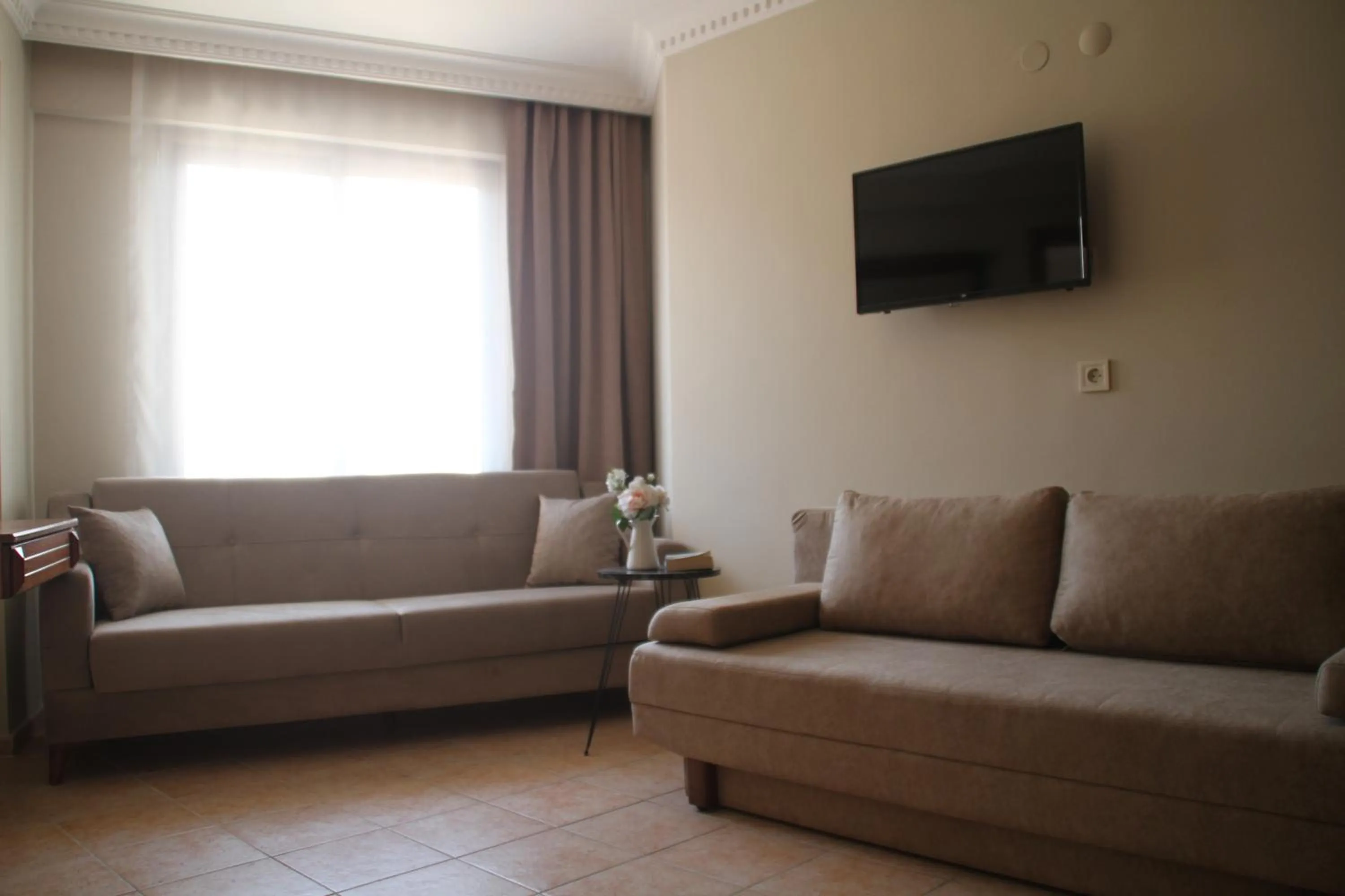 Living room in Rosy Suites Hotel