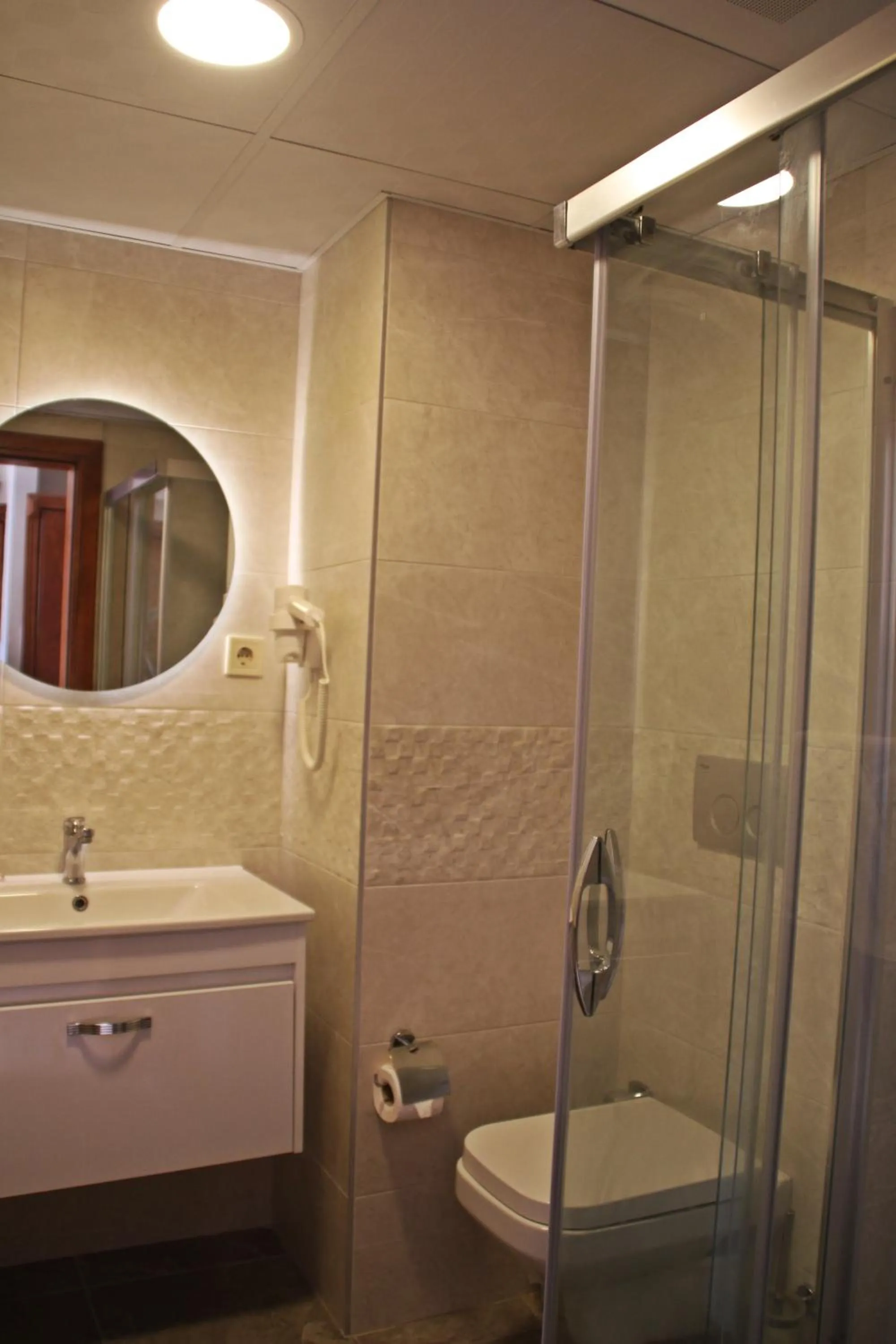 Bathroom in Rosy Suites Hotel