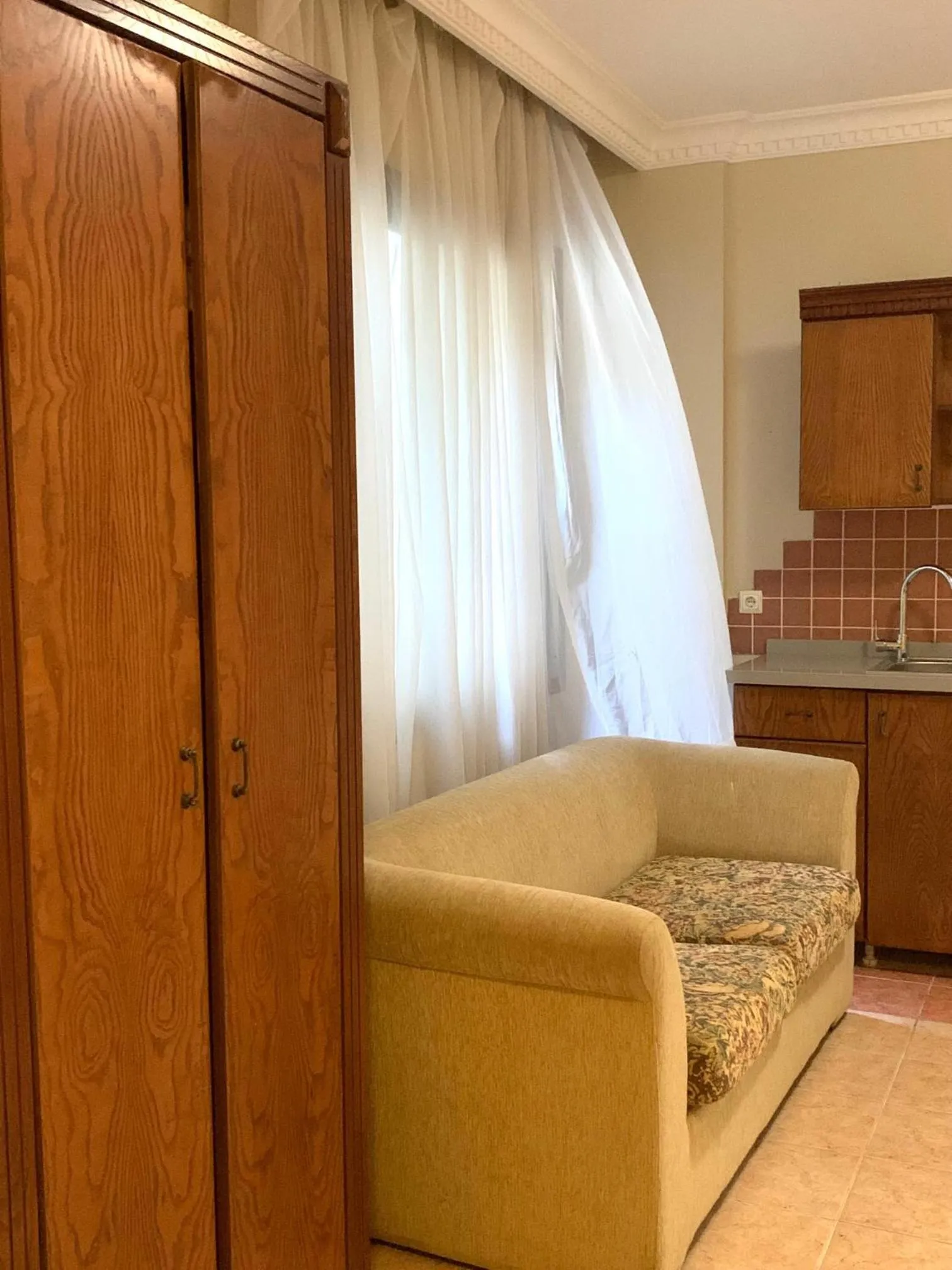 Kitchen or kitchenette in Rosy Suites Hotel