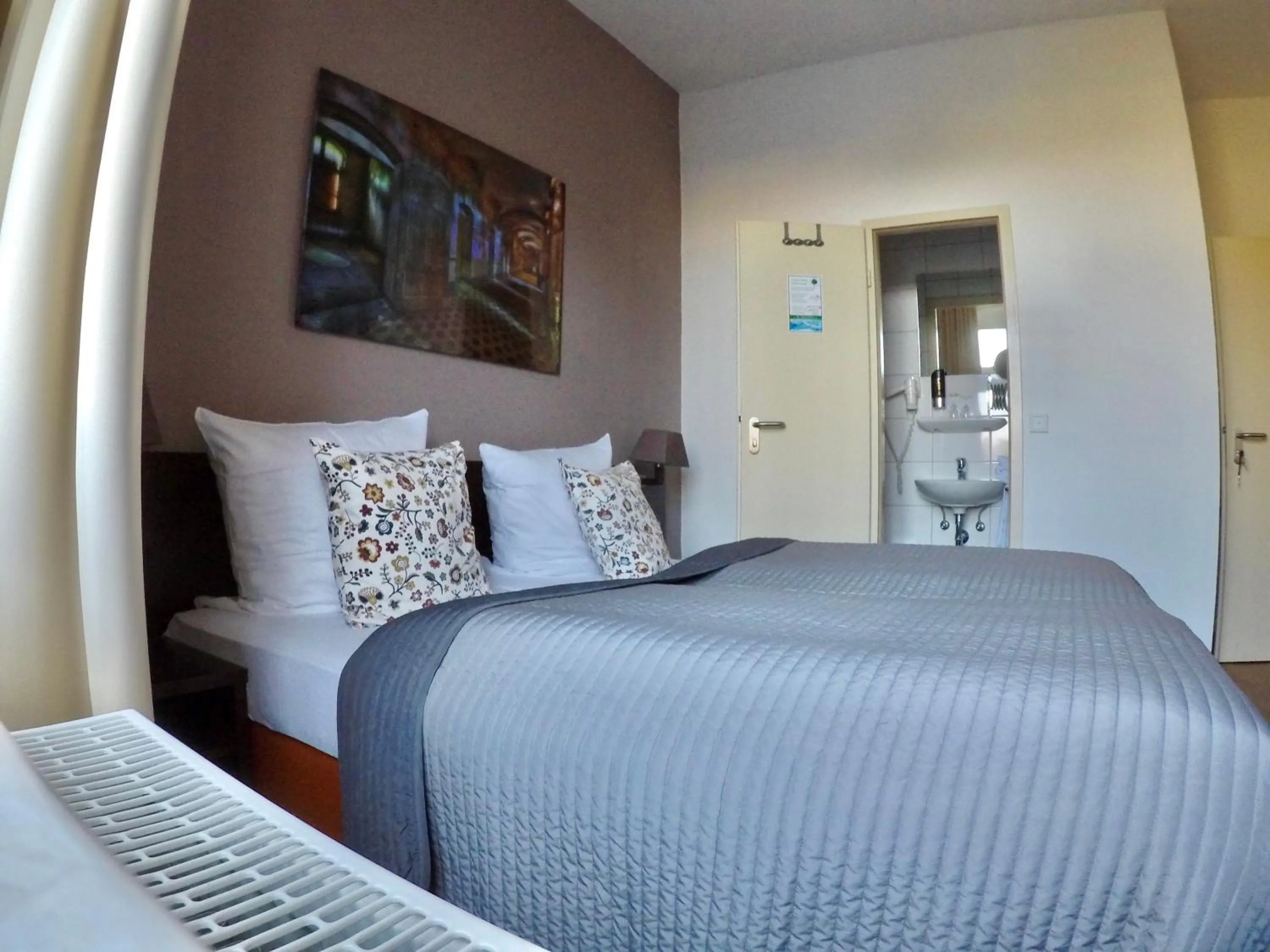 Photo of the whole room, Bed in DAS Steeps Ihr Brauhaus und Hotel