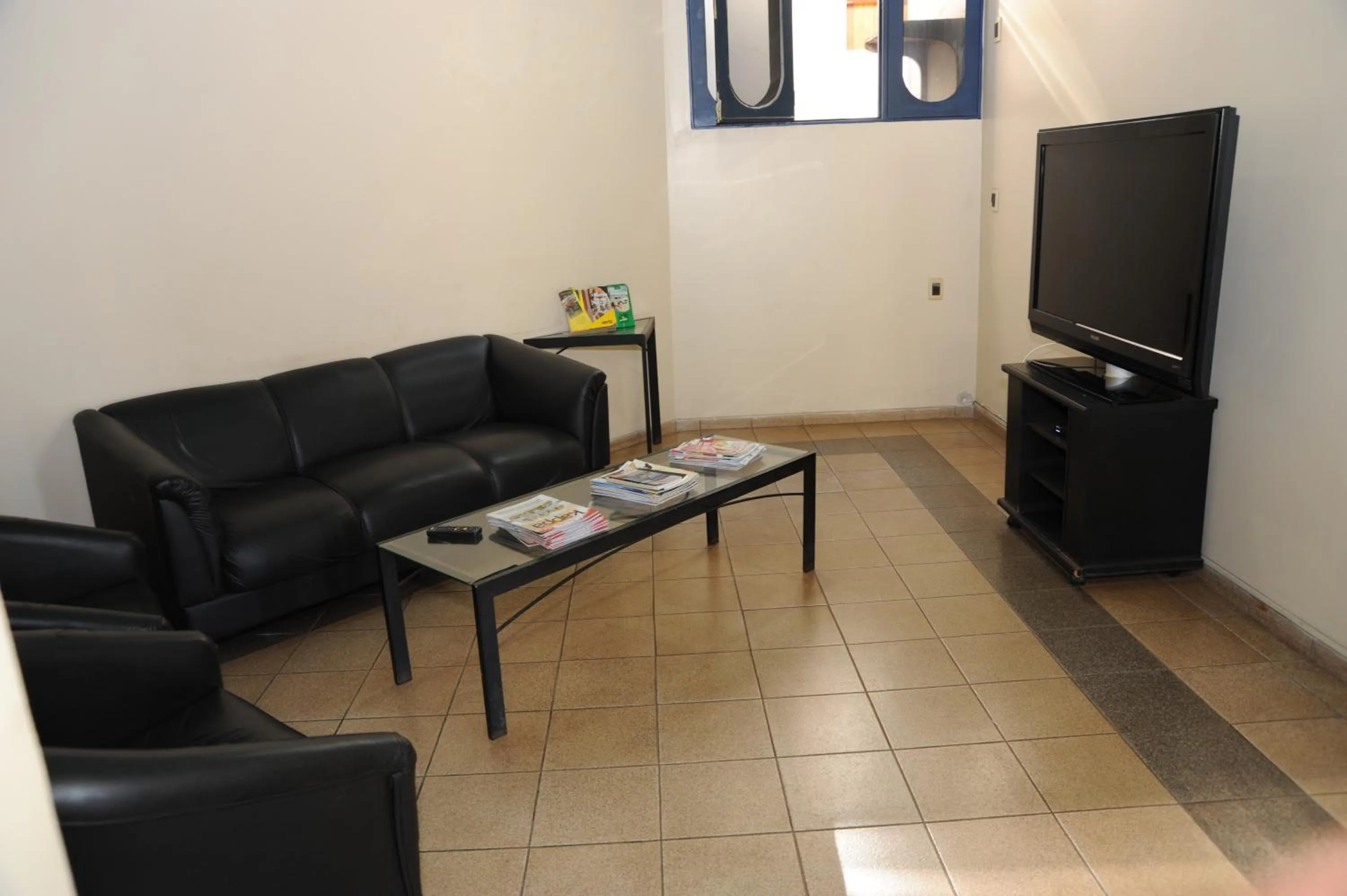 Communal lounge/ TV room in Hotel Varandas Araraquara