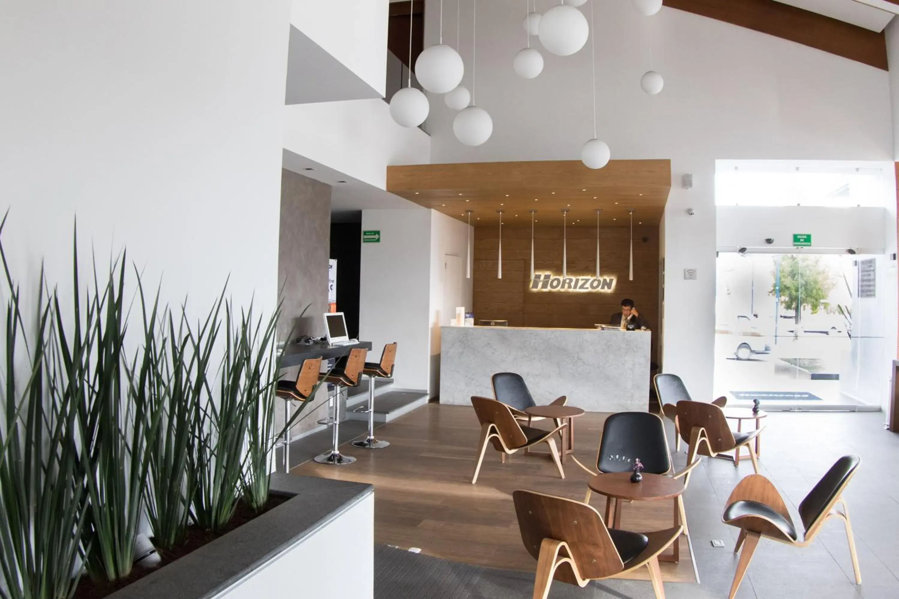 Lobby or reception in Hotel Horizon & Convention Center Lobby or reception in Hotel Horizon & Convention Center