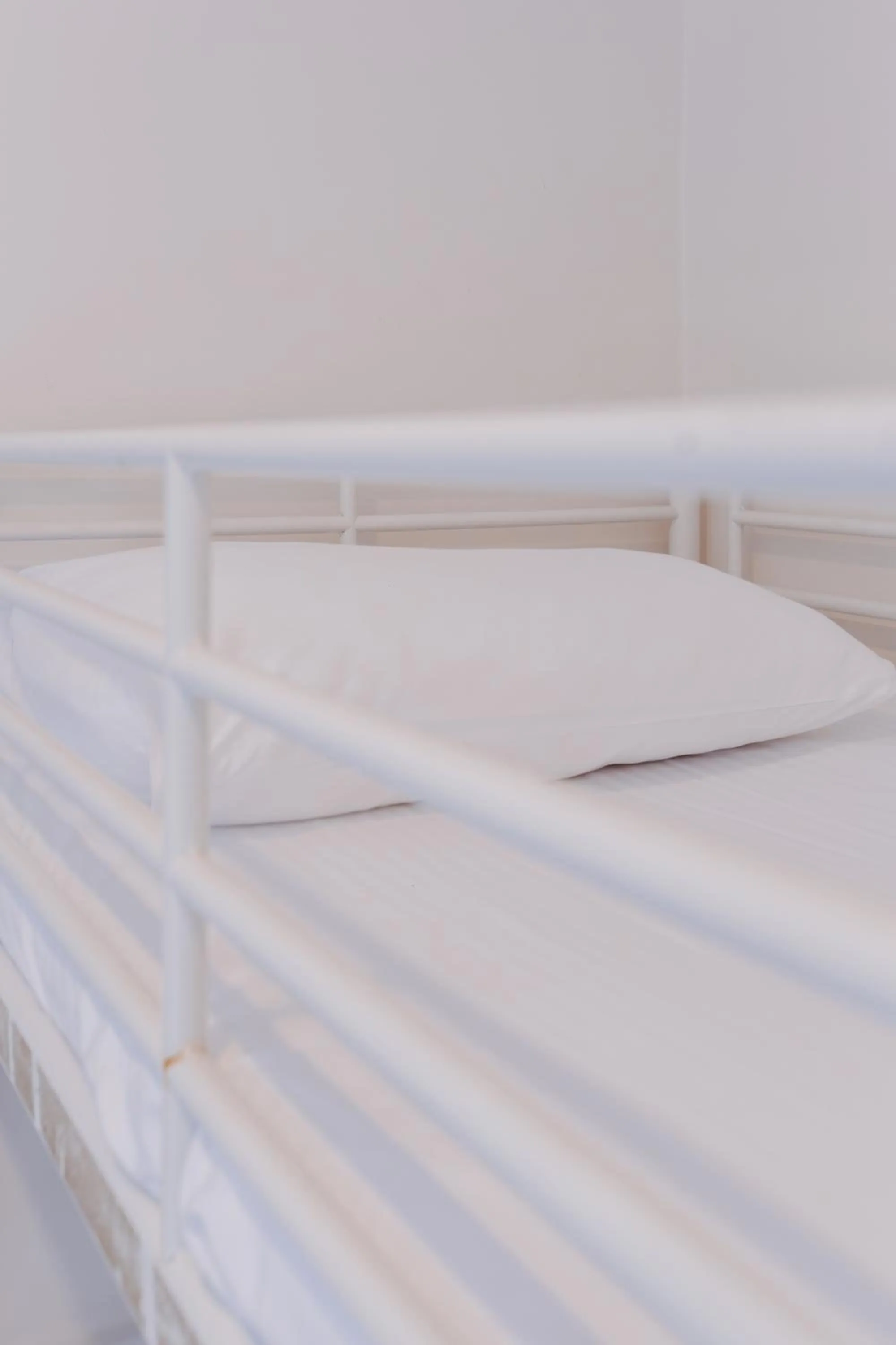 Bed in Beach Holiday Apartments