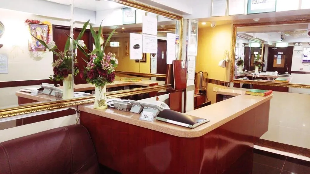 Text overlay in Days Hostel Block D 24 HOUR RECEPTION BLOCK D 10TH FLOOR