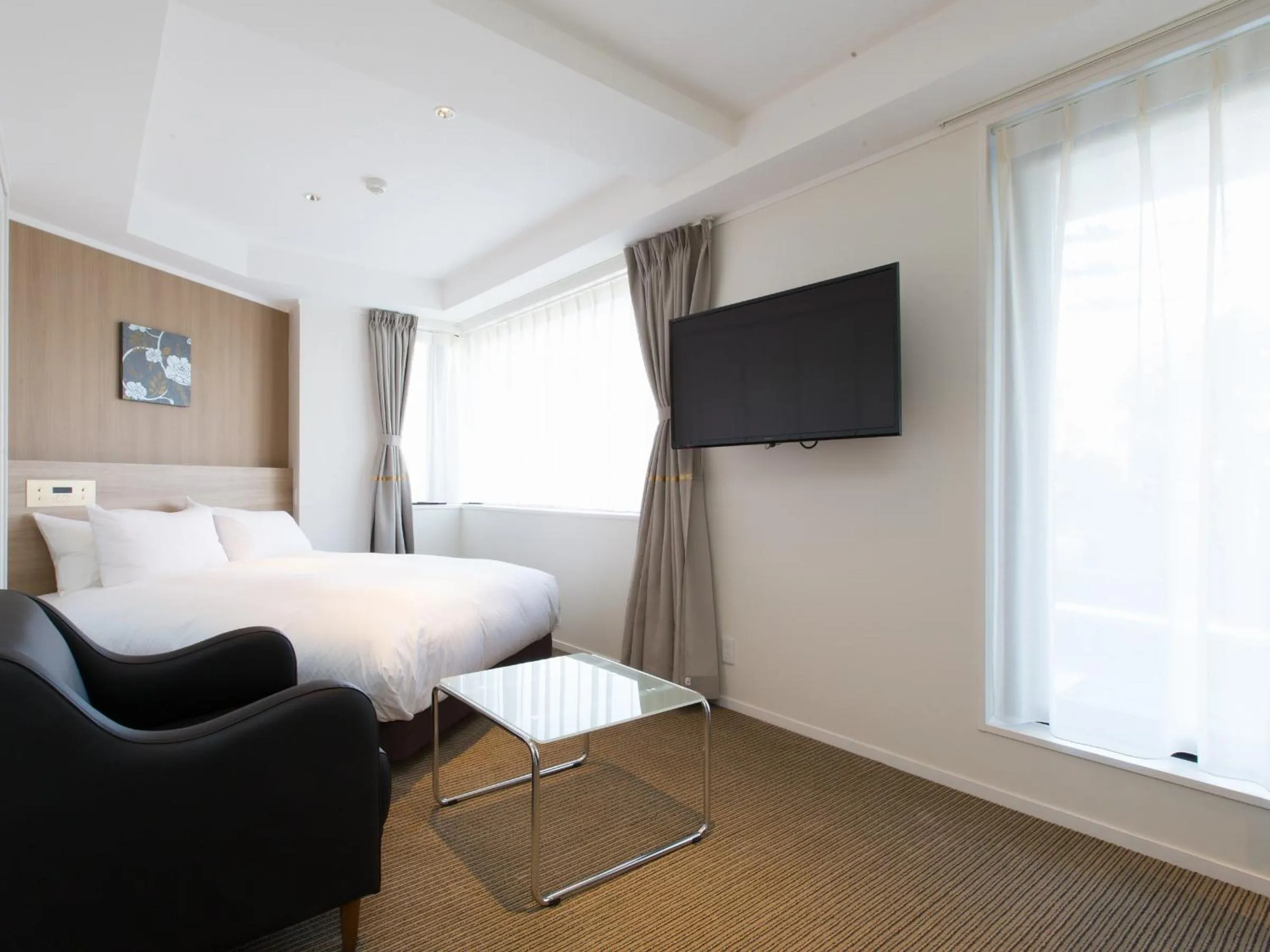 Bed in Hotel Shiki Utsubo Park