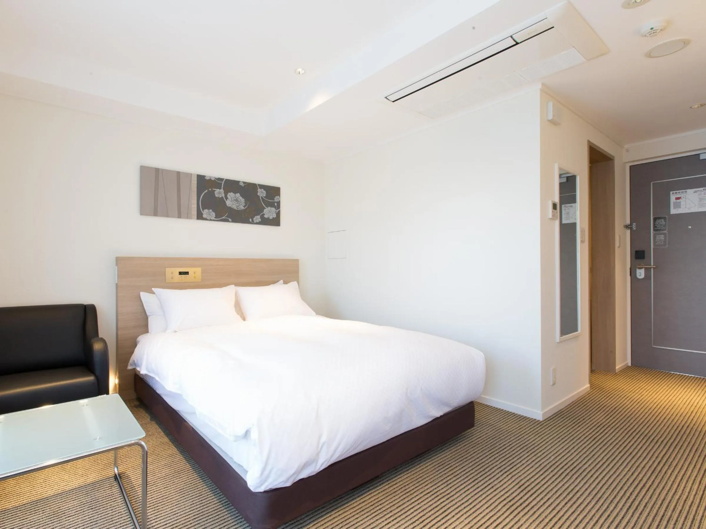 Bed in Hotel Shiki Utsubo Park