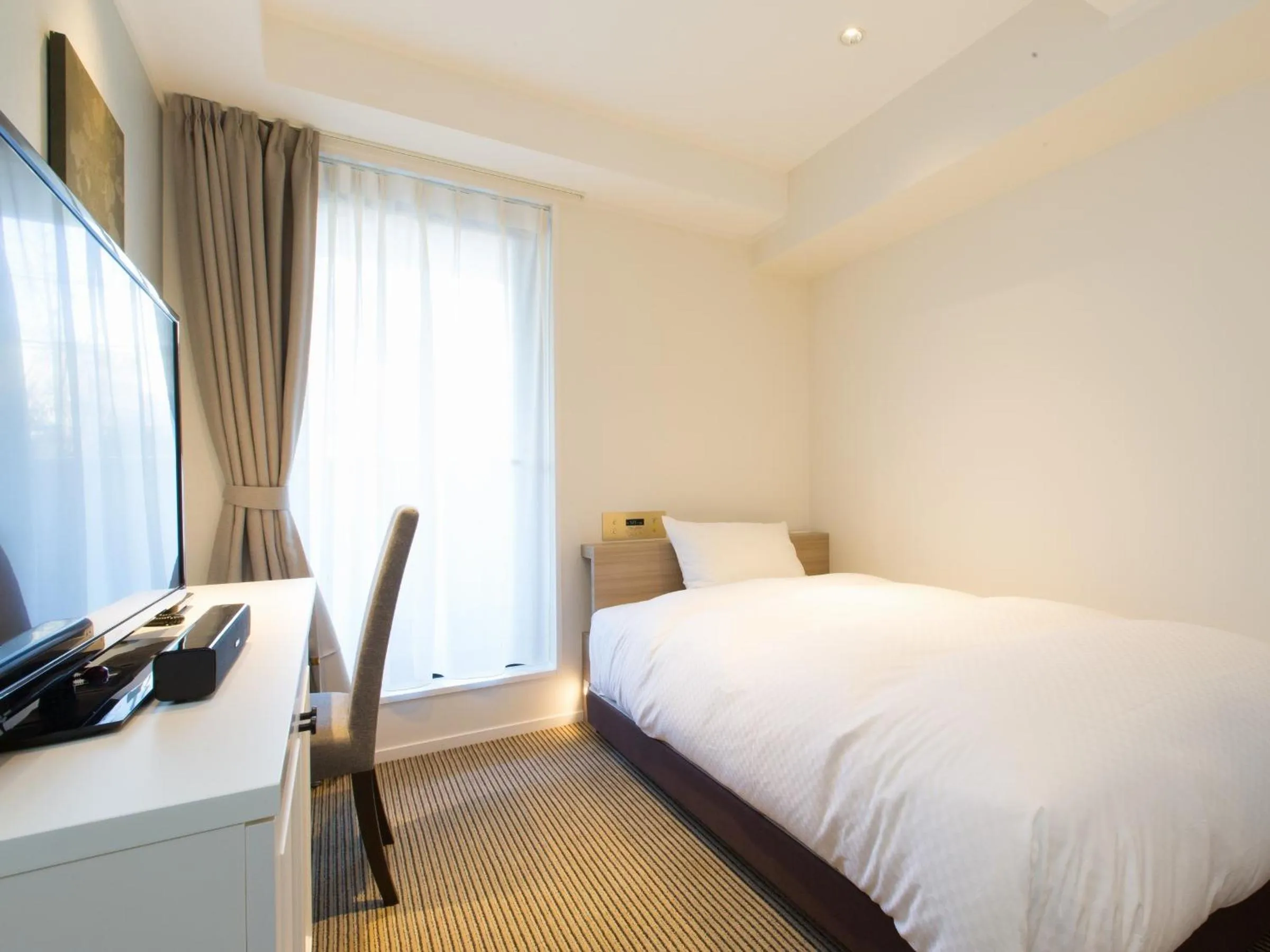 Bed in Hotel Shiki Utsubo Park