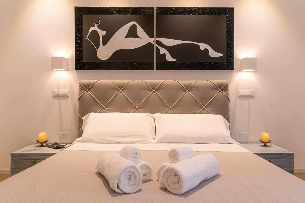 Bed in CeO LUXURY SUITE DI CAGLIARI