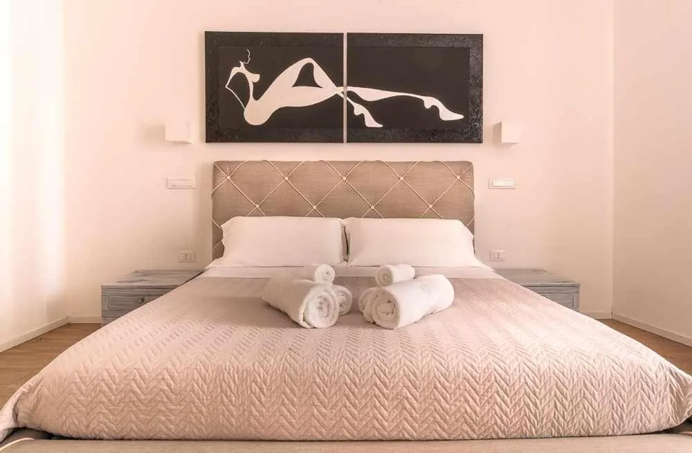 Bed in CeO LUXURY SUITE DI CAGLIARI