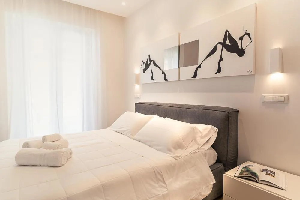 Bed in CeO LUXURY SUITE DI CAGLIARI