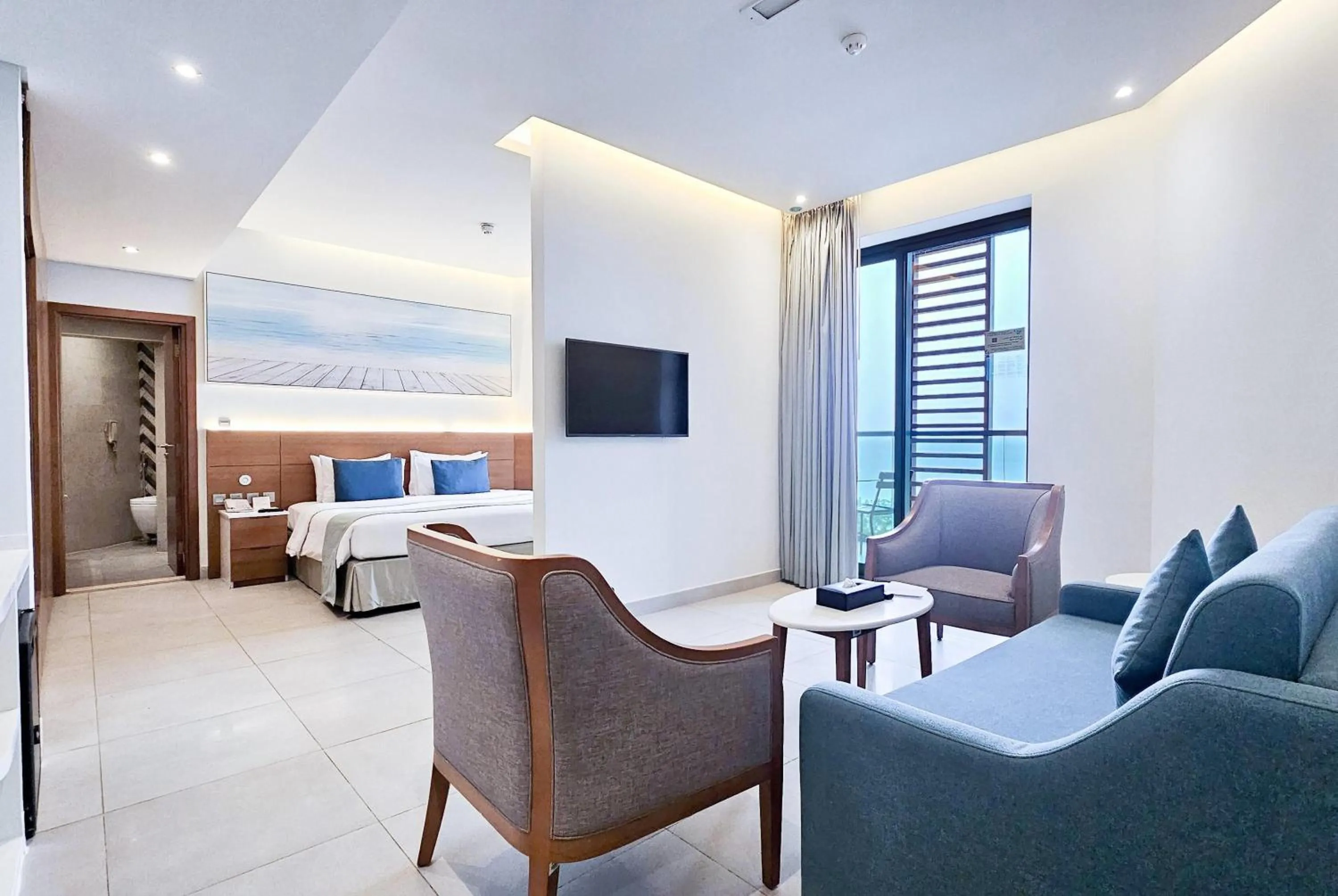 Photo of the whole room, Bed in Wyndham Garden Ajman Corniche