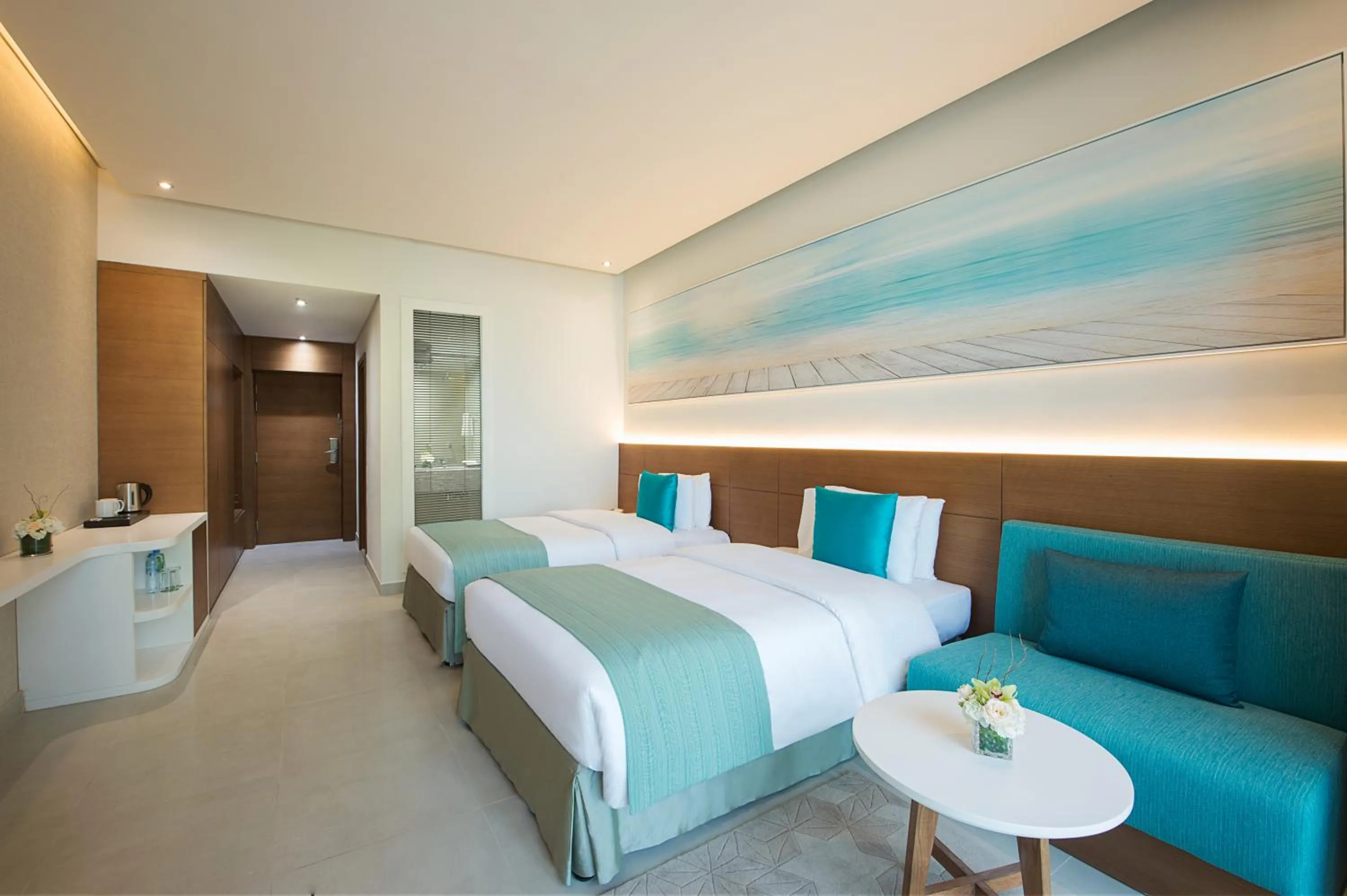 Photo of the whole room, Bed in Wyndham Garden Ajman Corniche