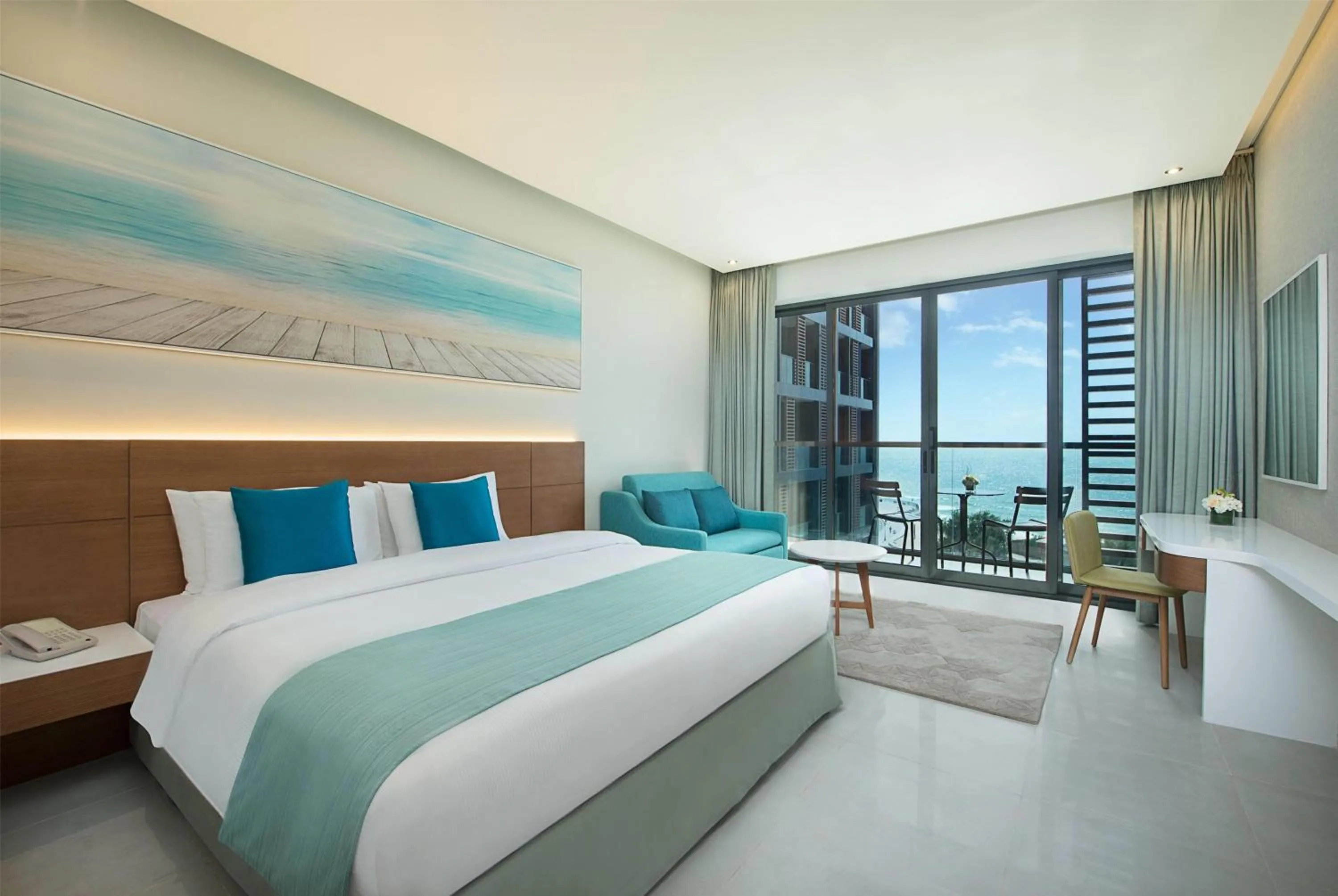 Photo of the whole room, Bed in Wyndham Garden Ajman Corniche